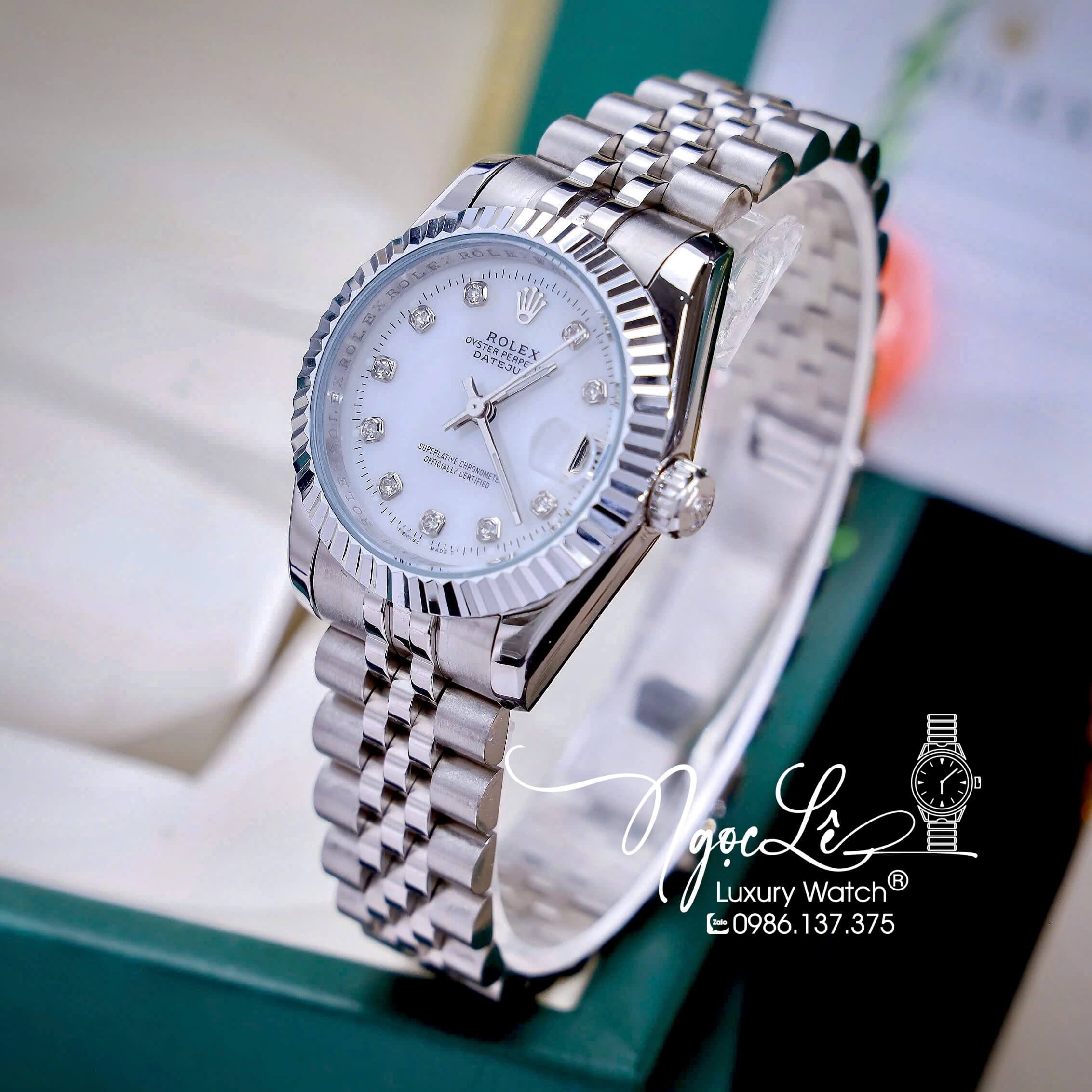 Đồng Hồ Nữ Rolex Datejust Máy Pin Dây Kim Loại Bạc Mặt Trắng Niềng Khía Size 31mm