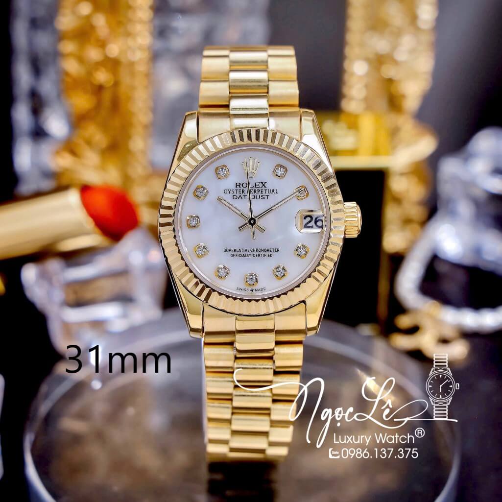 Đồng Hồ Nữ Rolex Datejust Pin Dây Kim Loại Vàng Mặt Trắng Xà Cừ Size 31mm