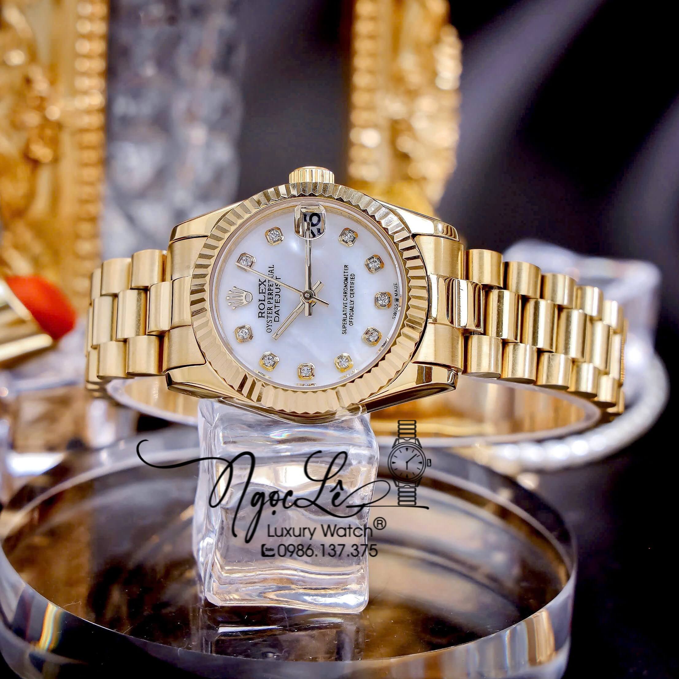Đồng Hồ Nữ Rolex Datejust Pin Dây Kim Loại Vàng Mặt Trắng Size 31mm