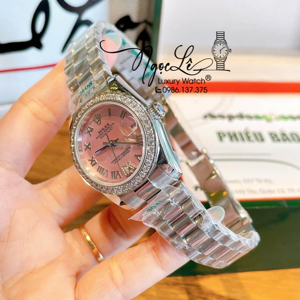 Đồng Hồ Nữ Rolex Datejust Tự Động Dây Bạc Mặt Hồng Nhạt Đính Đá Size 31mm - Mặt Số La Mã