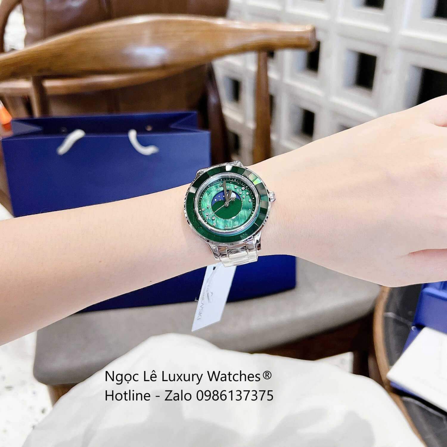 Đồng Hồ Nữ Swarovski Octea Lux Moon Dây Thép Silver Mặt Xà Cừ Viền Đá Pha Lê Xanh Ngọc Size 37mm