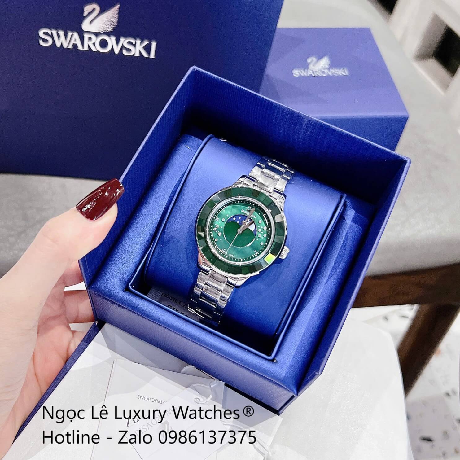 Đồng Hồ Nữ Swarovski Octea Lux Moon Dây Thép Silver Mặt Xà Cừ Viền Đá Pha Lê Xanh Ngọc Size 37mm