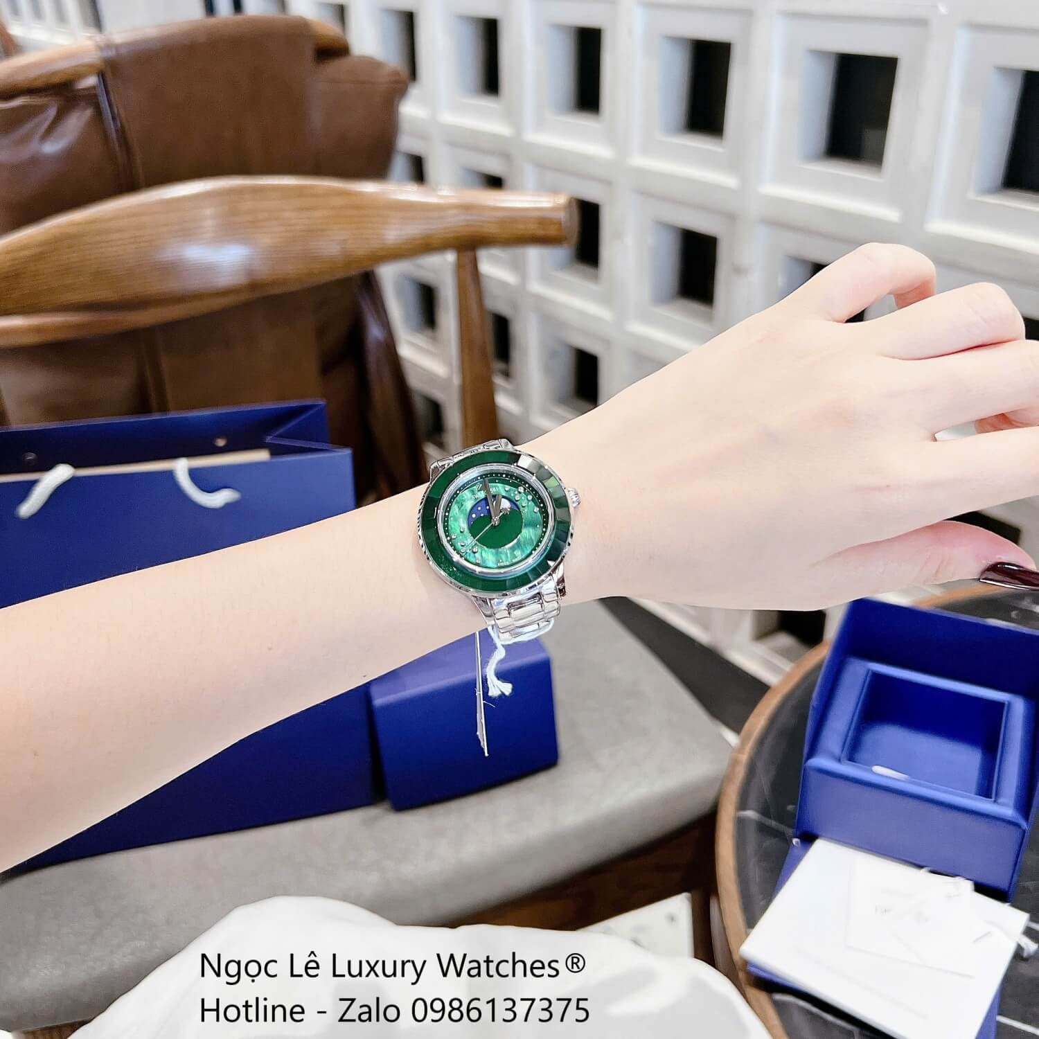 Đồng Hồ Nữ Swarovski Octea Lux Moon Dây Thép Silver Mặt Xà Cừ Viền Đá Pha Lê Xanh Ngọc Size 37mm