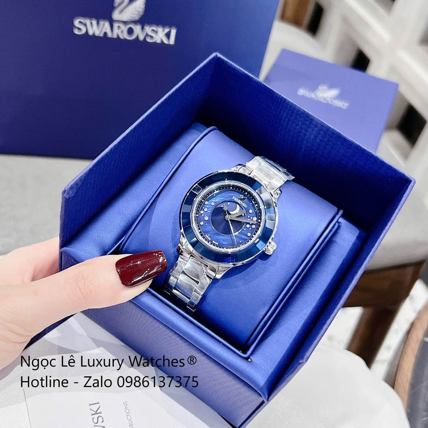 Đồng Hồ Nữ Swarovski Octea Lux Moon Dây Thép Silver Mặt Xà Cừ Viền Đá Pha Lê Xanh Dương Size 37mm
