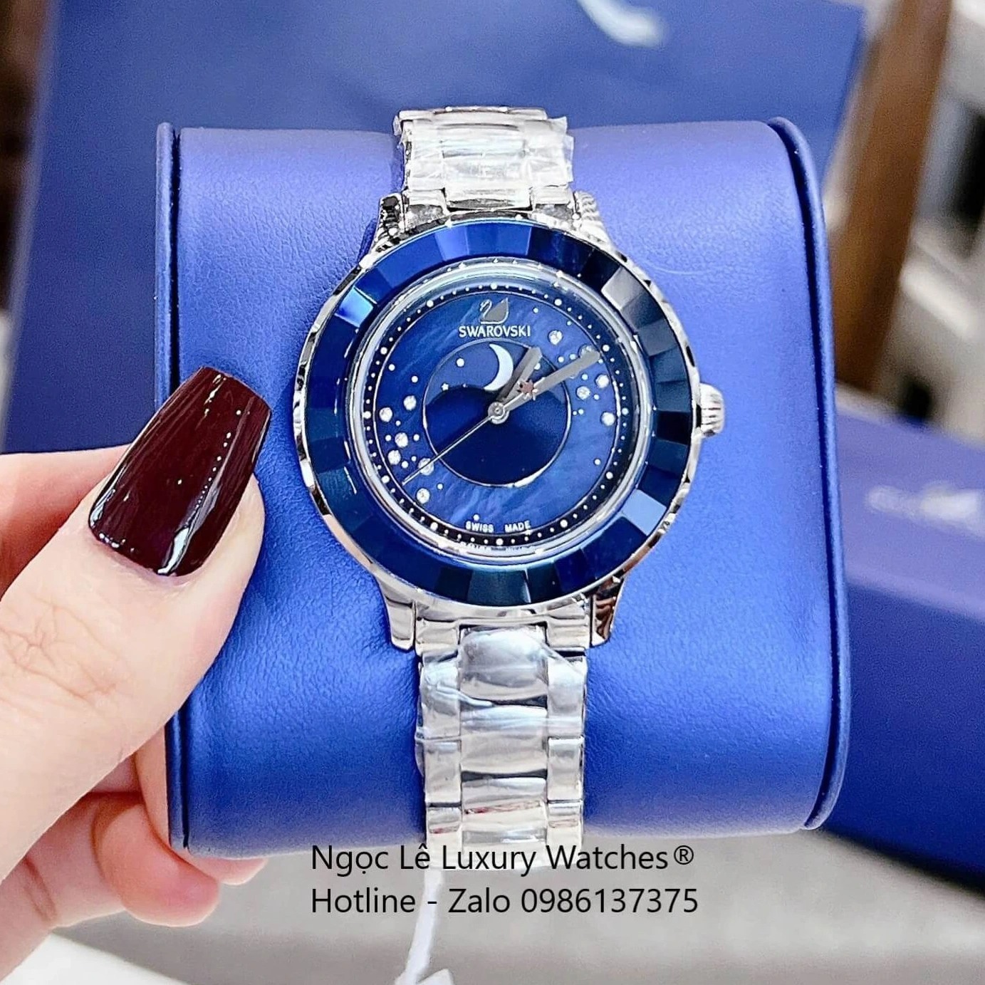 Đồng Hồ Nữ Swarovski Octea Lux Moon Dây Thép Silver Mặt Xà Cừ Viền Đá Pha Lê Xanh Dương Size 37mm