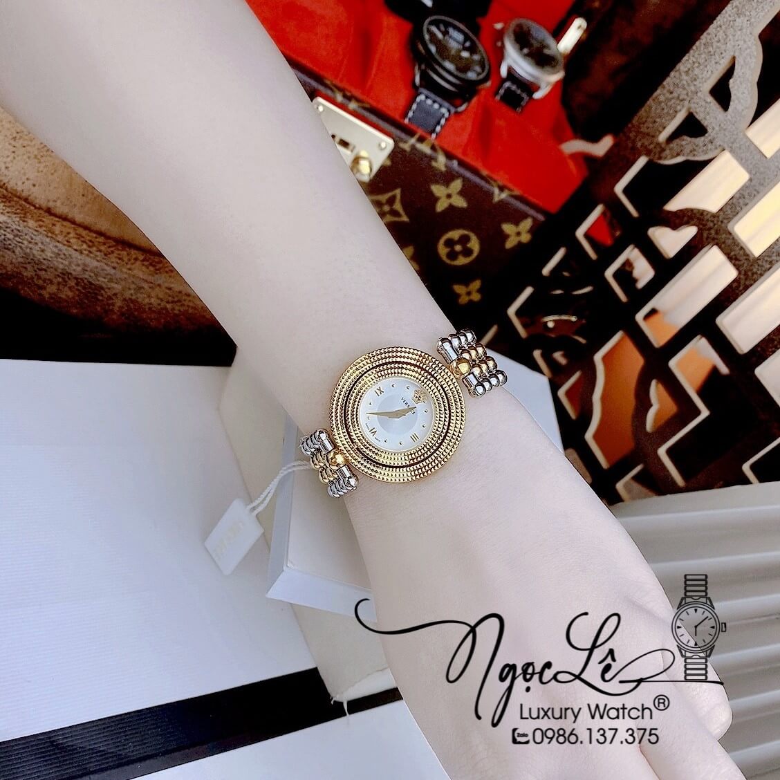 Đồng Hồ Nữ Versace Eon Mother Of Pearl Dây Bi Demi Vàng Mặt Trắng Xoay 360 Độ 34mm