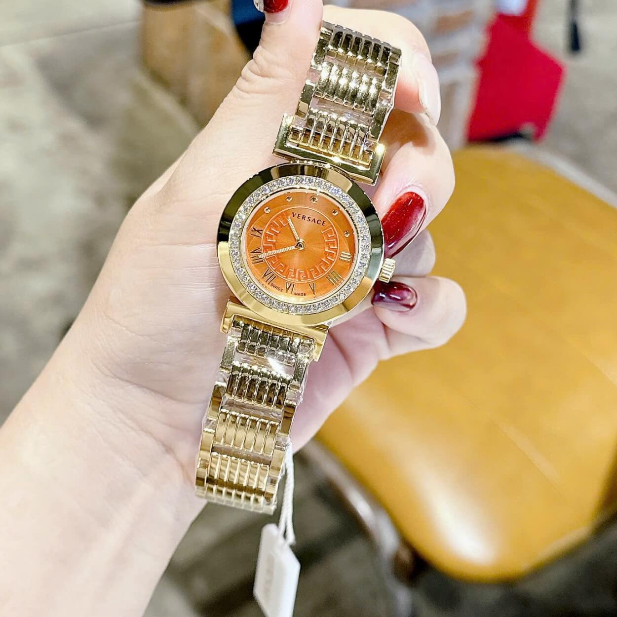 Đồng hồ Versace nữ dây thép vàng mặt cam, Versace Vanity Thụy Sĩ size 35mm - Quartz