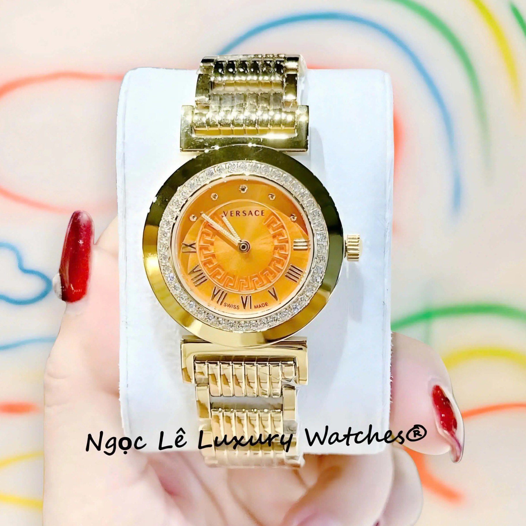 Đồng hồ Versace nữ dây thép vàng mặt cam, Versace Vanity Thụy Sĩ size 35mm - Quartz
