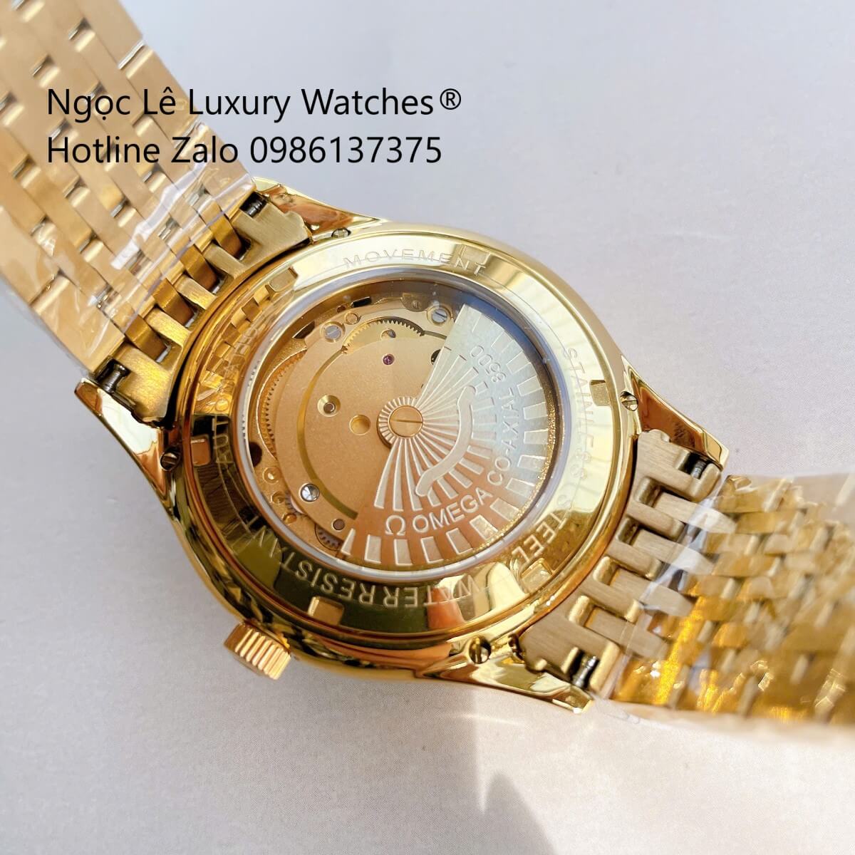 Đồng Hồ Omega Nam Máy Cơ Tự Động Mặt Thuyền Buồm Dây Vàng Mặt Nâu Size 40mm