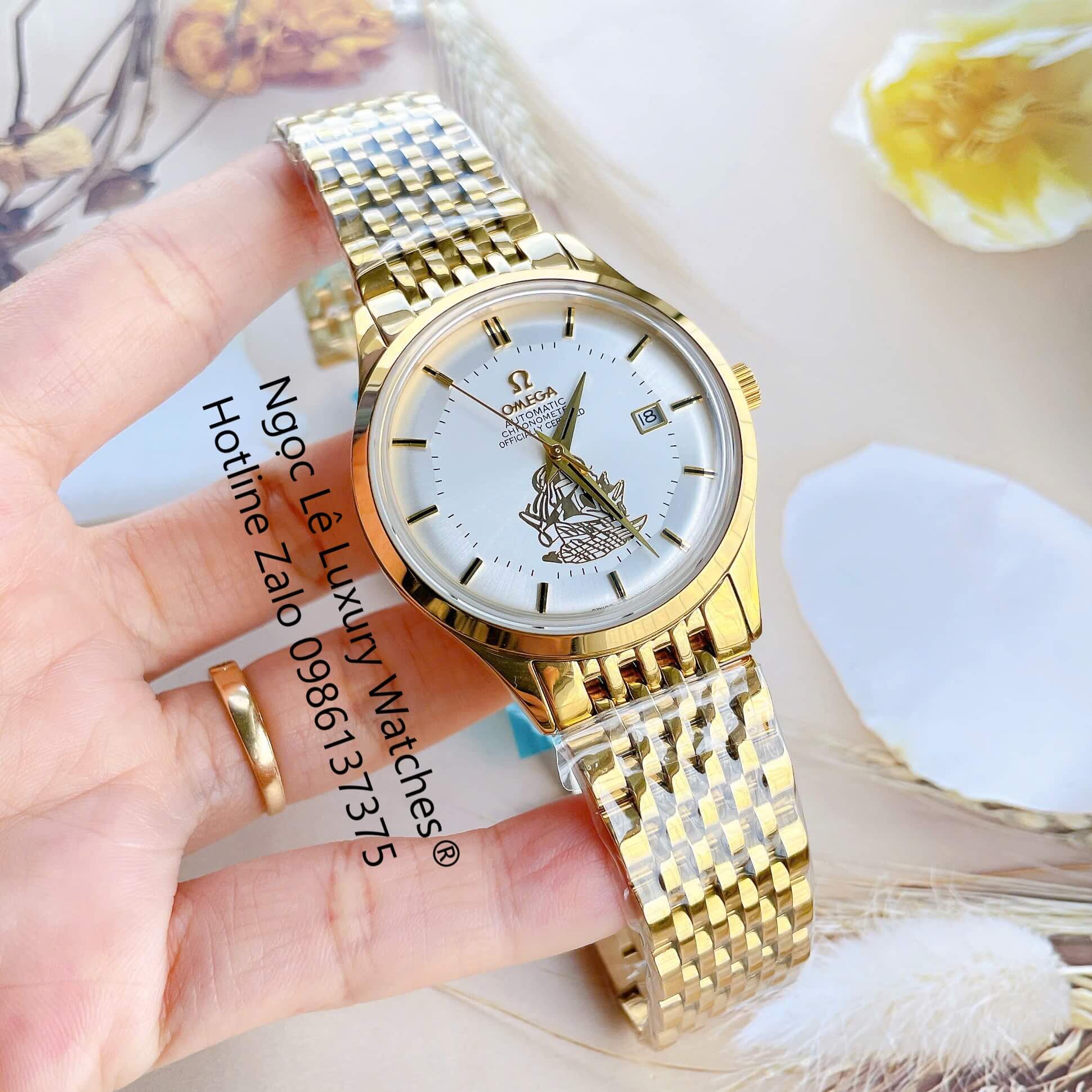 Đồng Hồ Omega Nam Máy Cơ Tự Động Mặt Thuyền Buồm Dây Kim Loại Màu Vàng Mặt Trắng Size 40mm