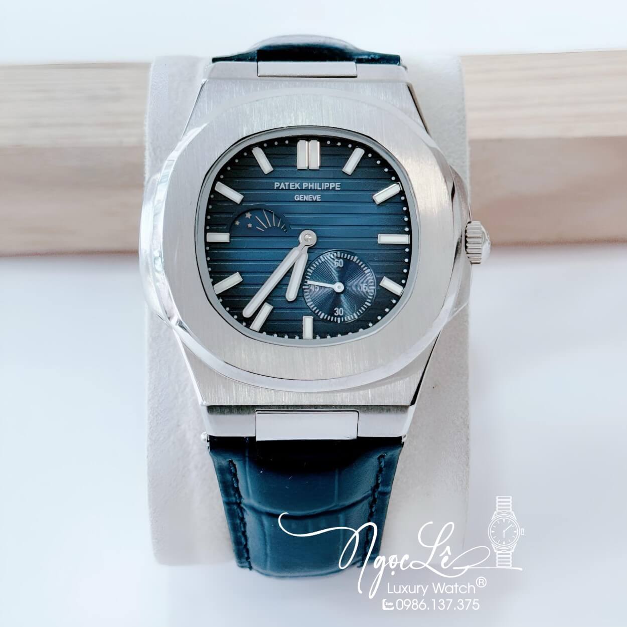 Đồng Hồ Nam Patek Philippe Nautilus Tự Động Dây Da Xanh Dương Silver Niềng Trơn Size 40mm