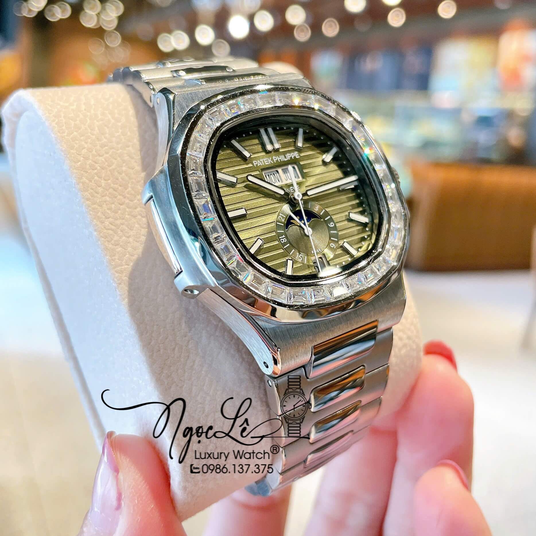 Đồng Hồ Patek Philippe Nautilus Nam Tự Động Dây Kim Loại Silver Mặt Xanh Rêu Lạnh Đính Đá Size 40mm