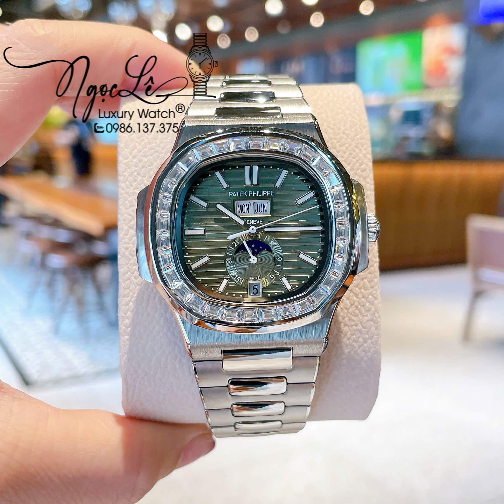 Đồng Hồ Patek Philippe Nautilus Nam Tự Động Dây Kim Loại Silver Mặt Xanh Rêu Lạnh Đính Đá Size 40mm