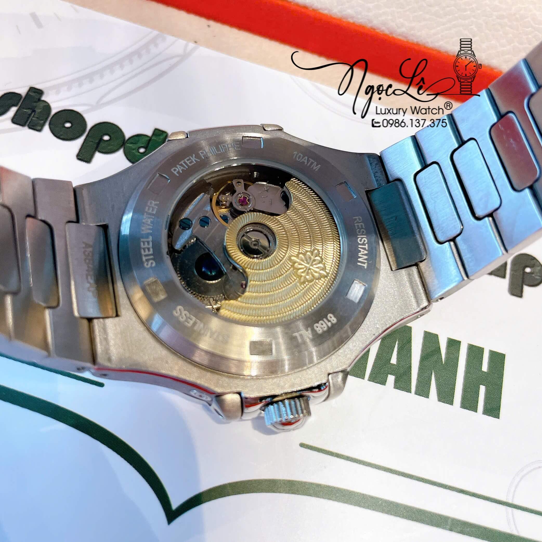 Đồng Hồ Patek Philippe Nautilus Nam Tự Động Dây Kim Loại Silver Mặt Xanh Rêu Lạnh Đính Đá Size 40mm