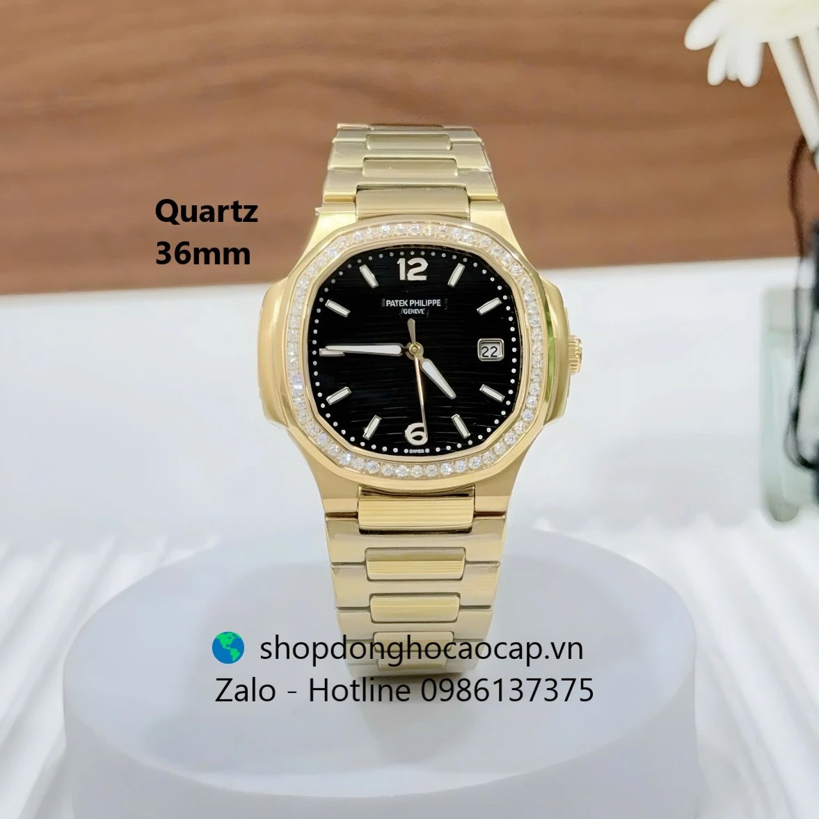 Đồng hồ Patek Philippe Nautilus nữ màu vàng size 36mm, đồng hồ nữ mặt màu đen máy Quartz