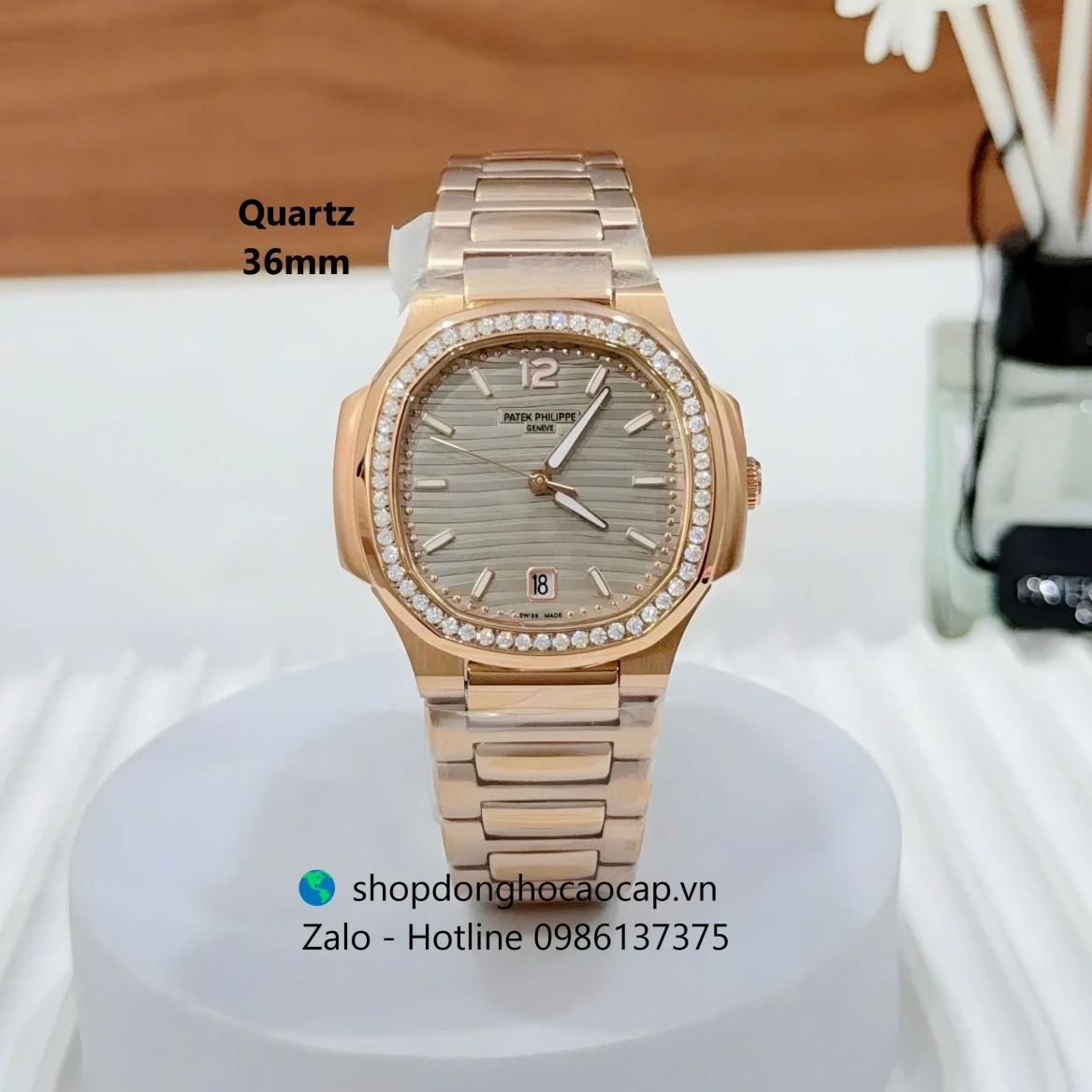 Đồng hồ Patek Philippe Nautilus nữ màu vàng hồng size 36mm, đồng hồ nữ mặt màu xám đồng máy Quartz