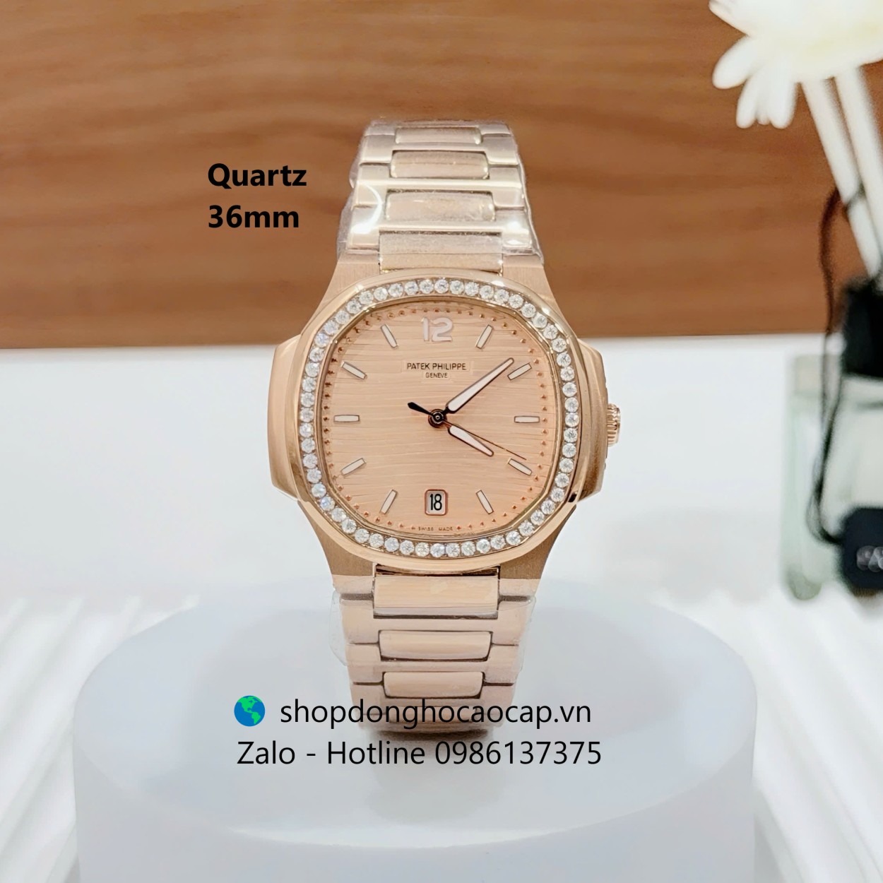 Đồng hồ Patek Philippe Nautilus nữ màu vàng hồng size 36mm, đồng hồ nữ viền đá sang trọng máy Quartz