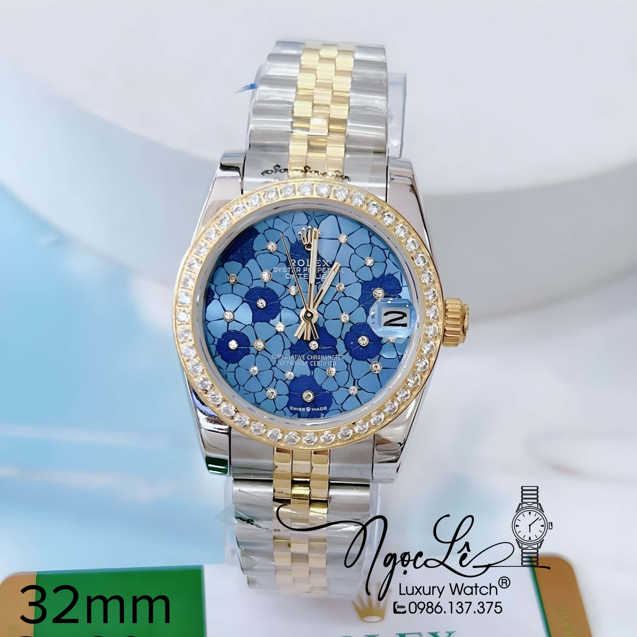 Đồng Hồ Nữ Rolex Datejust Pin Màu Demi Vàng Mặt Hoa Xanh Dương Đính Đá Size 32mm