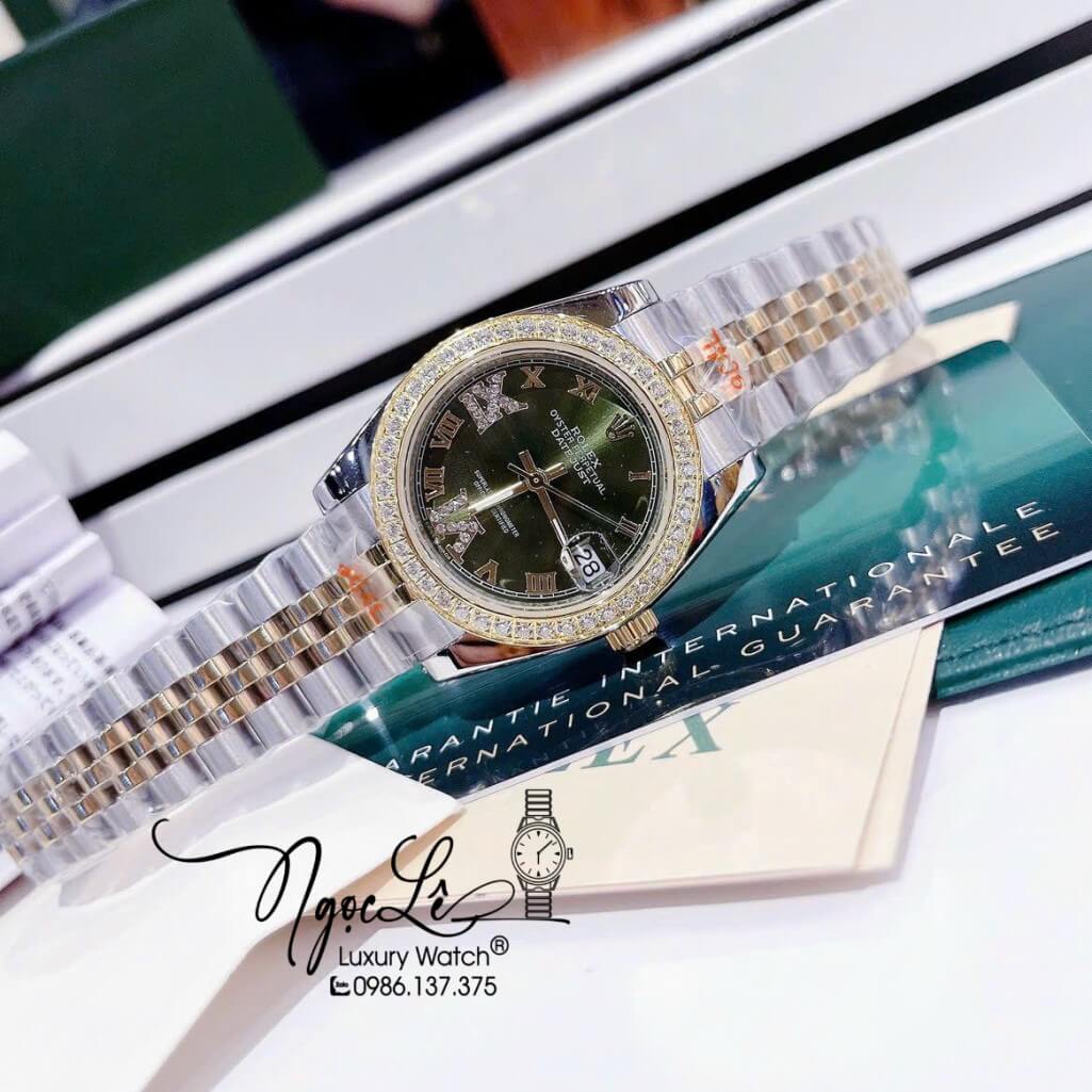 Đồng Hồ Rolex Datejust Nữ Máy Pin Màu Demi Rose Mặt Xanh Viền Đá 32mm