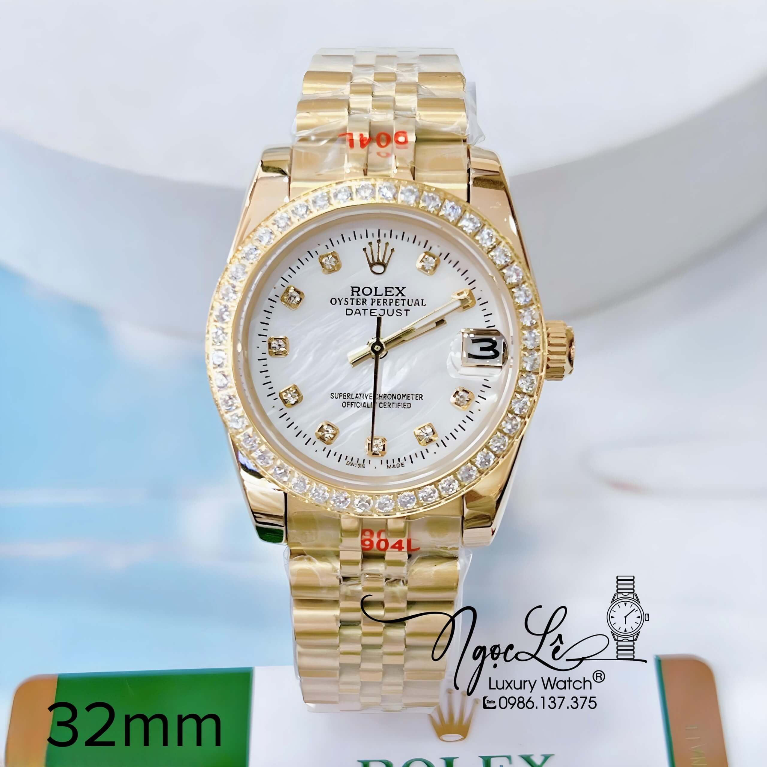 Đồng Hồ Nữ Rolex Datejust Pin Dây Kim Loại Vàng Mặt Trắng Xà Cừ Đính Đá Size 32mm