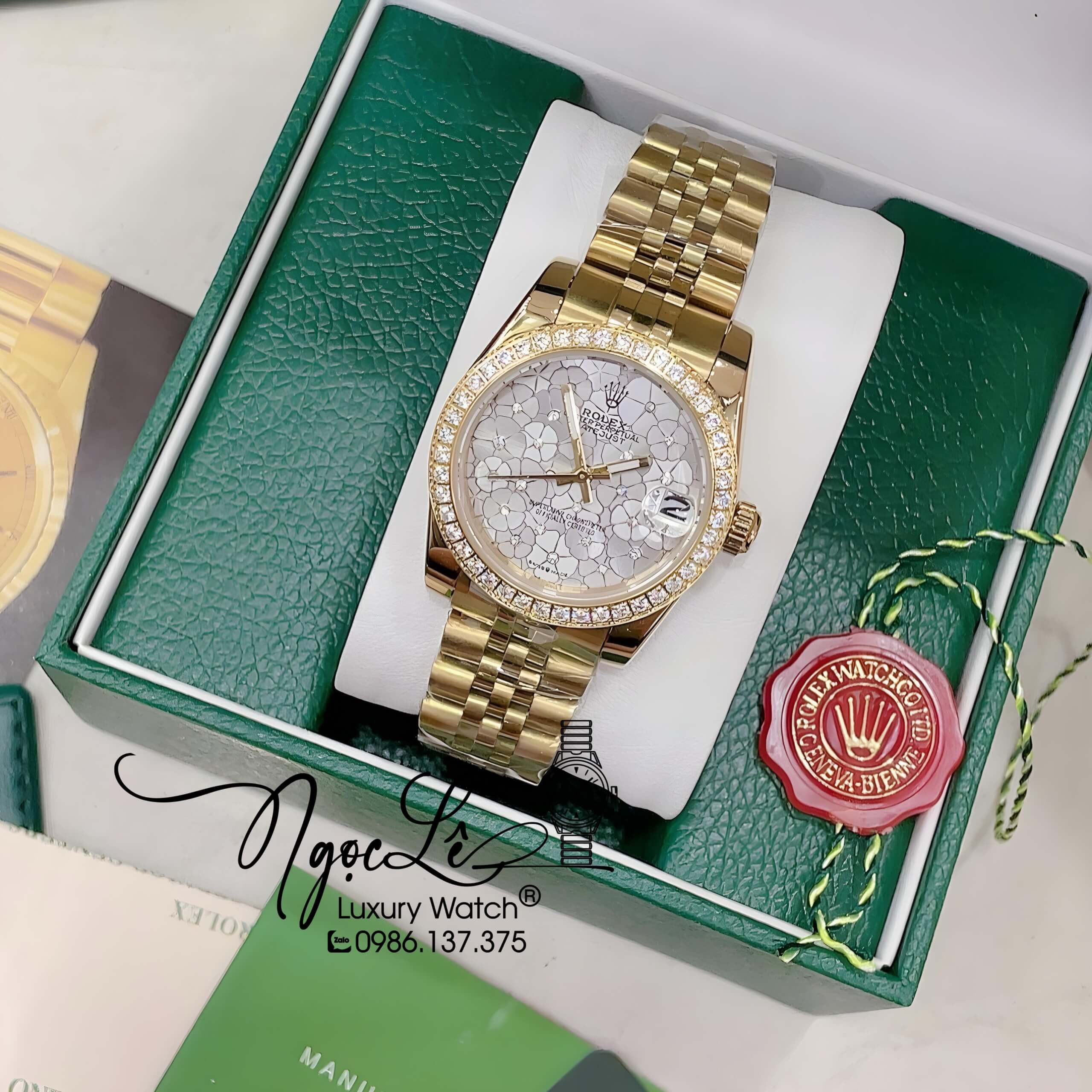 Đồng Hồ Nữ Rolex Datejust Pin Màu Vàng Mặt Trắng Họa Tiết Hoa Đính Đá Size 32mm