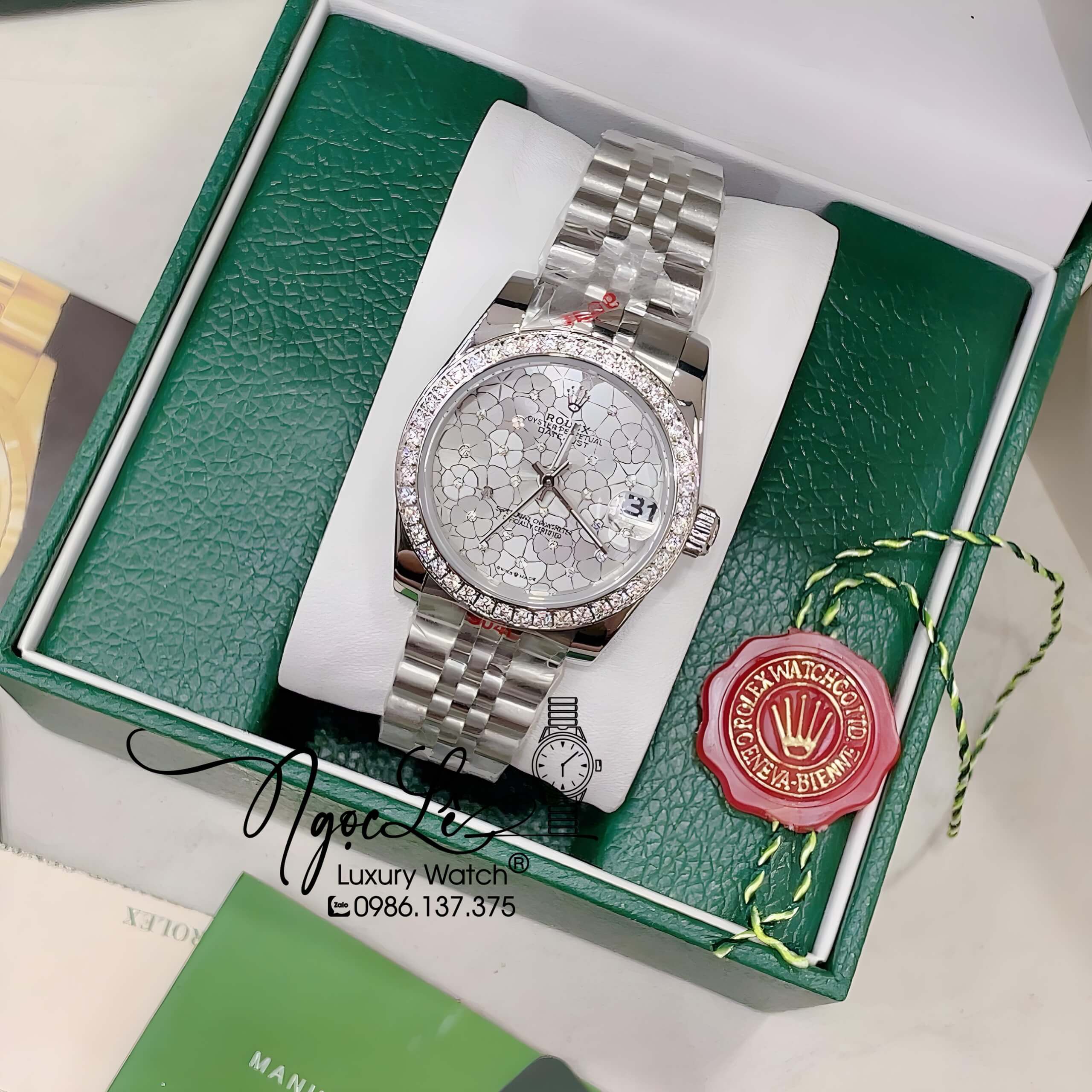 Đồng Hồ Nữ Rolex Datejust Pin Màu Bạc Mặt Trắng Họa Tiết Hoa Đính Đá Size 32mm