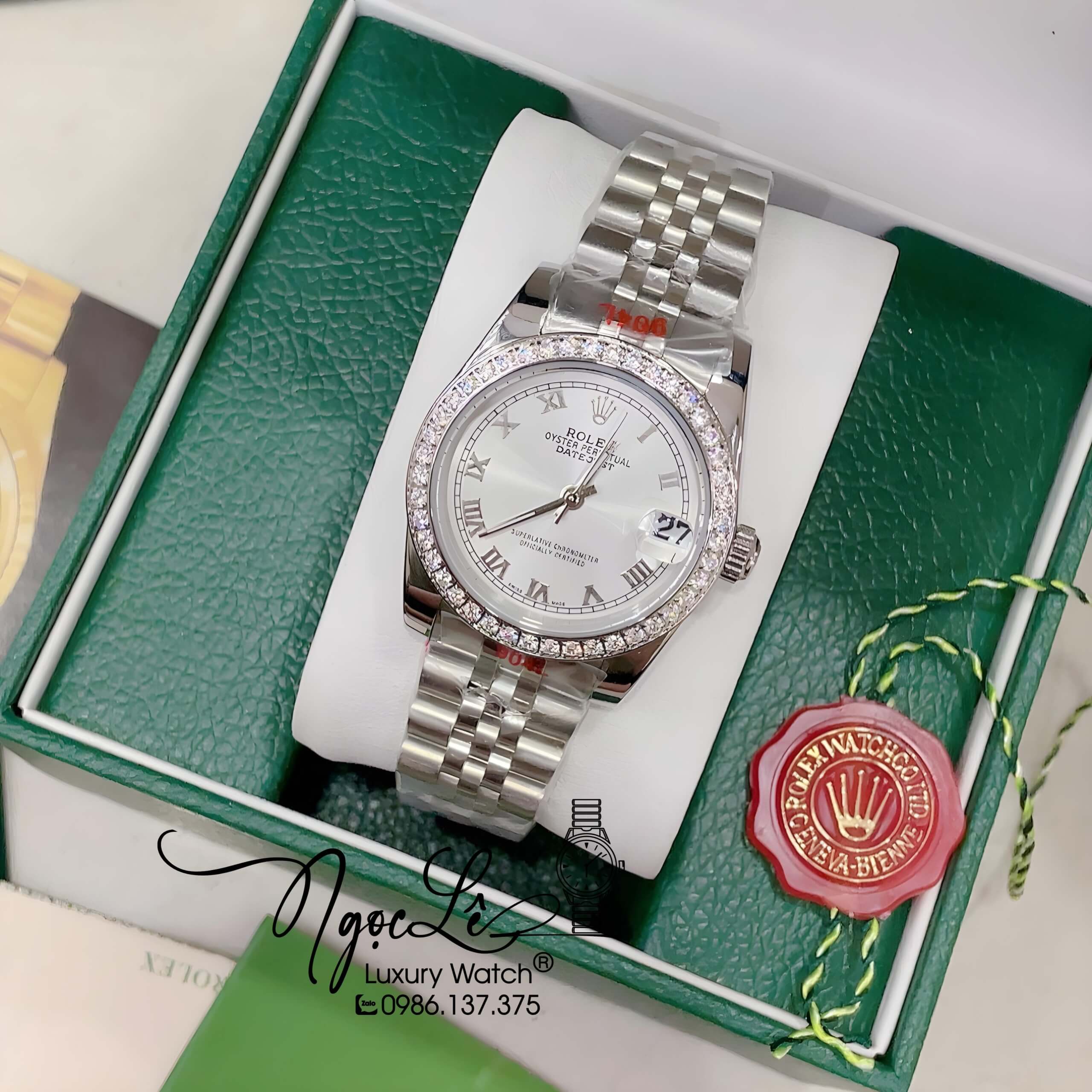 Đồng Hồ Nữ Rolex Datejust Pin Màu Bạc Mặt Trắng Số La Mã Đính Đá Size 32mm