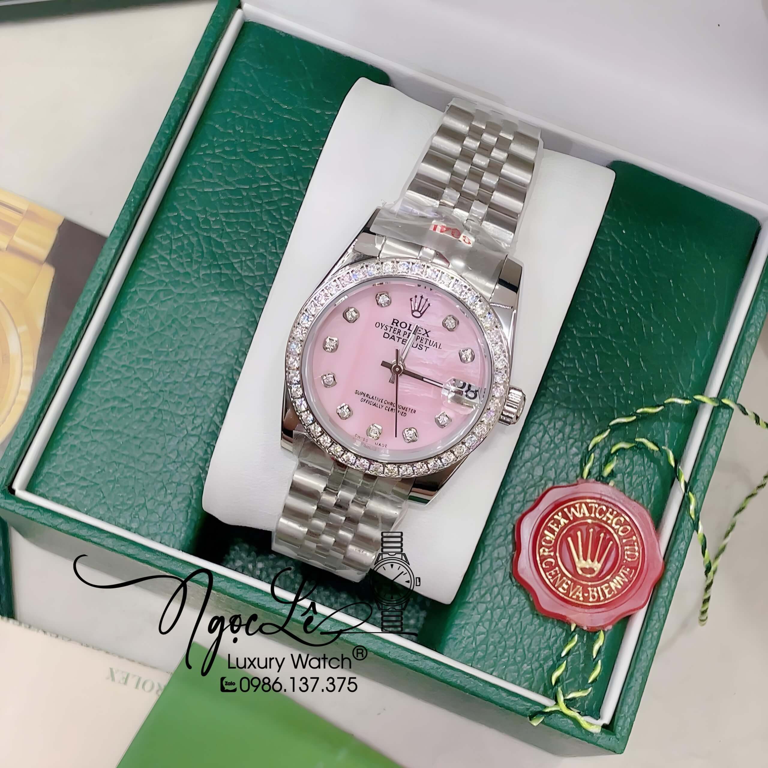 Đồng Hồ Nữ Rolex Datejust Pin Màu Bạc Mặt Hồng Xà Cừ Đính Đá Size 32mm