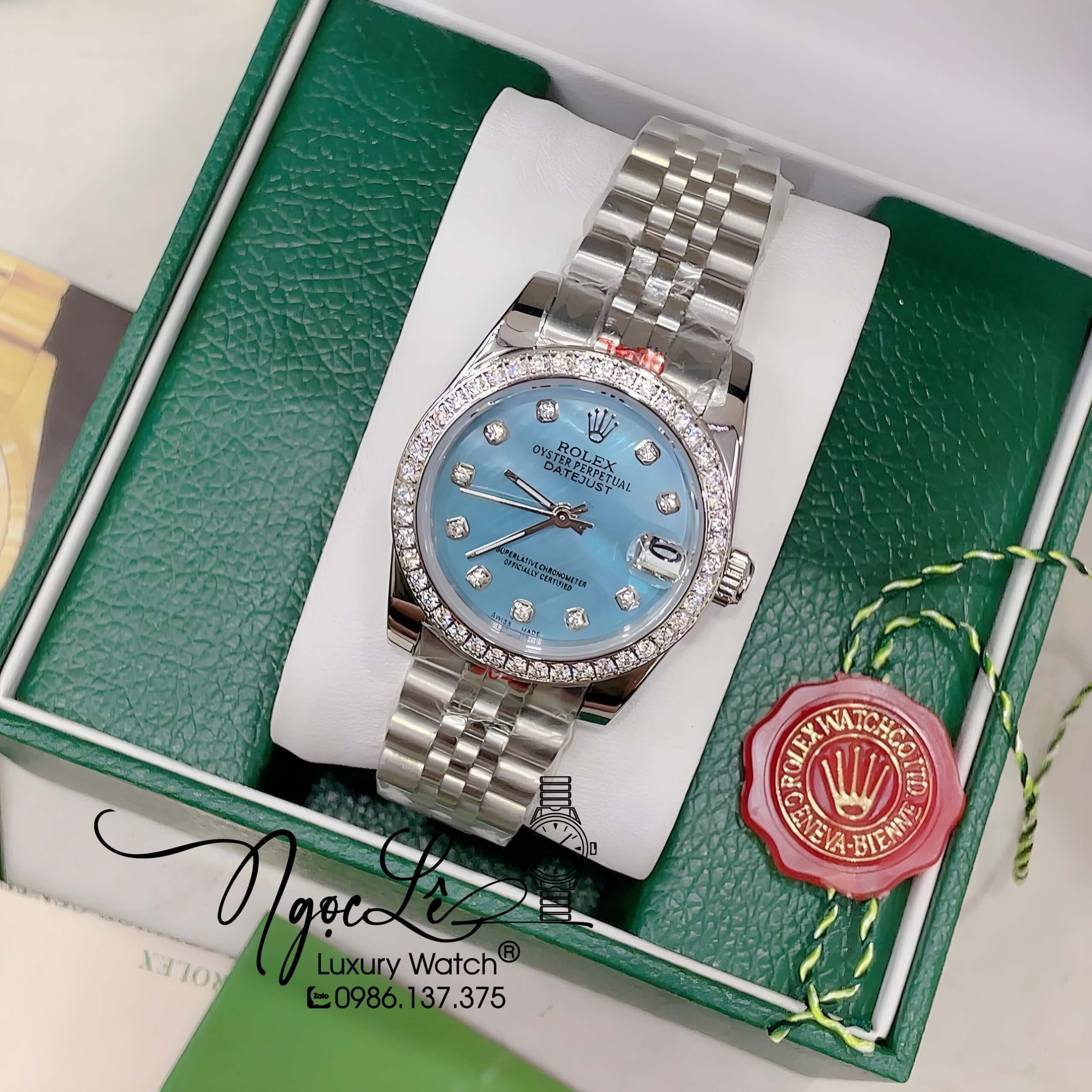 Đồng Hồ Nữ Rolex Datejust Pin Màu Bạc Mặt Xanh Xà Cừ Đính Đá Size 32mm