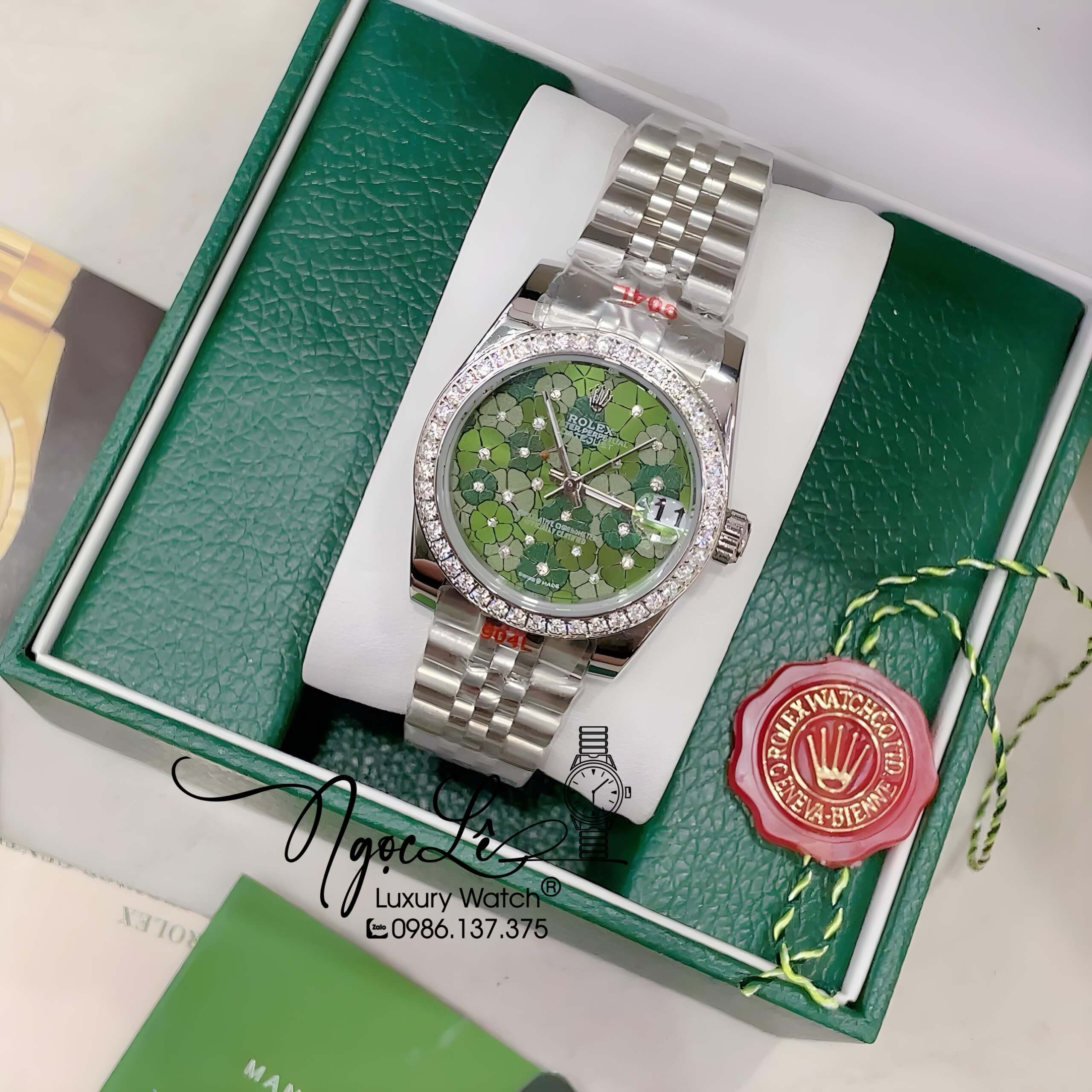 Đồng Hồ Nữ Rolex Datejust Pin Màu Bạc Mặt Xanh Olive Họa Tiết Hoa Đính Đá Size 32mm