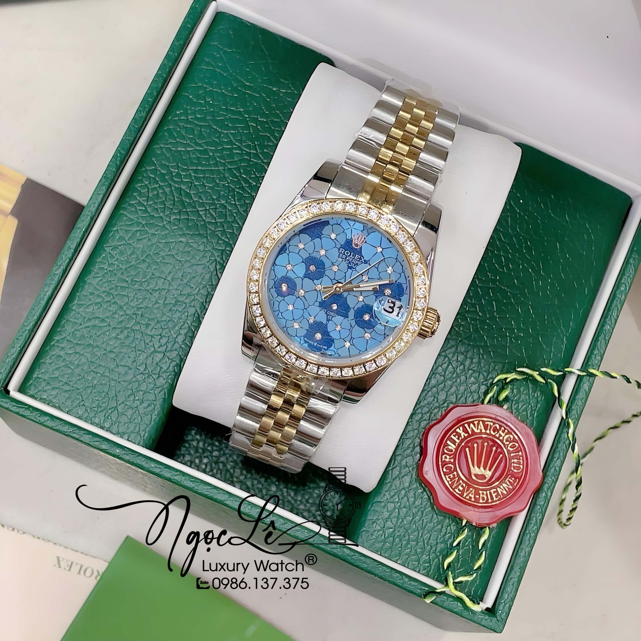 Đồng Hồ Nữ Rolex Datejust Pin Màu Demi Mặt Xanh Dương Họa Tiết Hoa Đính Đá Size 32mm