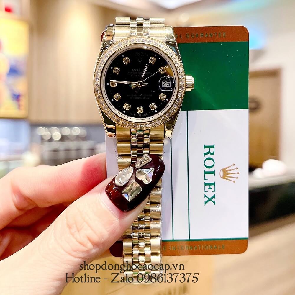 Đồng Hồ Rolex Datejust Nữ Dây Vàng Mặt Đen Viền Đá 32mm