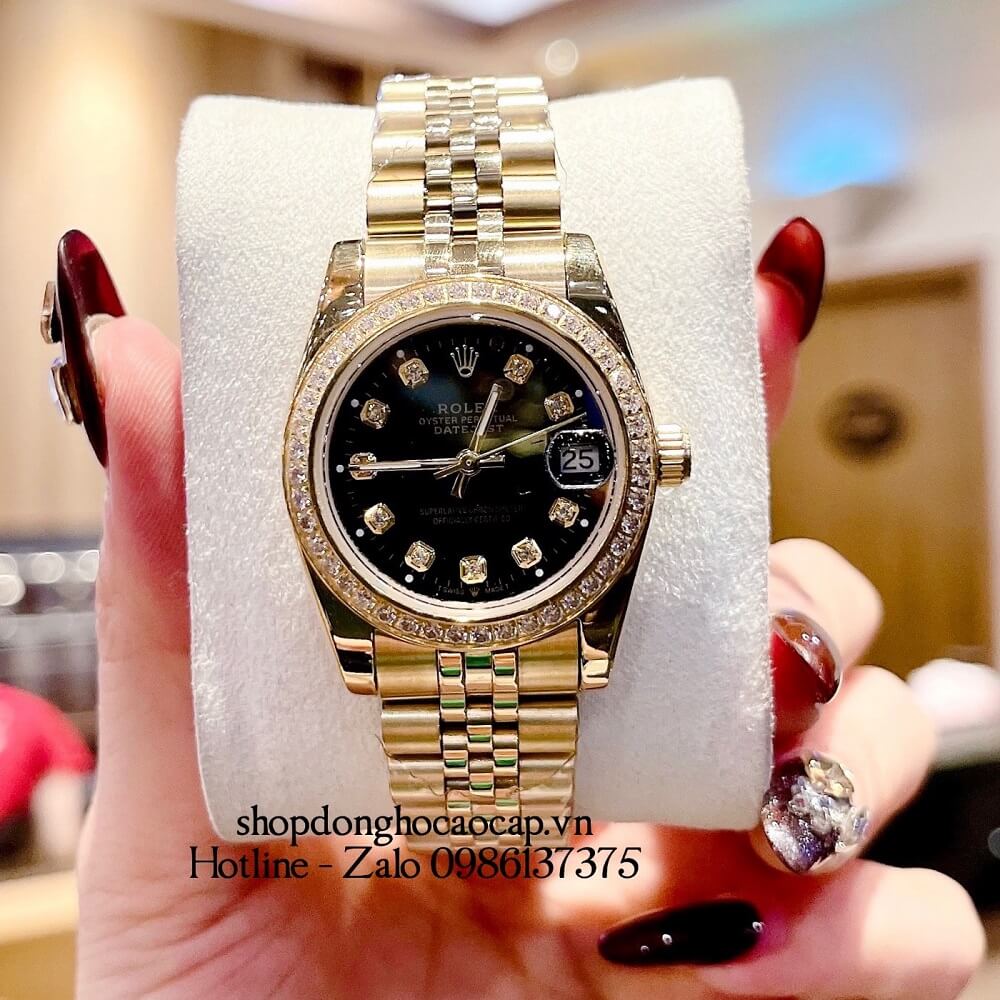 Đồng Hồ Rolex Datejust Nữ Dây Vàng Mặt Đen Viền Đá 32mm