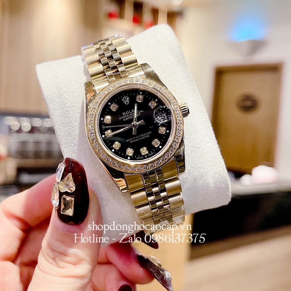 Đồng Hồ Rolex Datejust Nữ Dây Vàng Mặt Đen Viền Đá 32mm