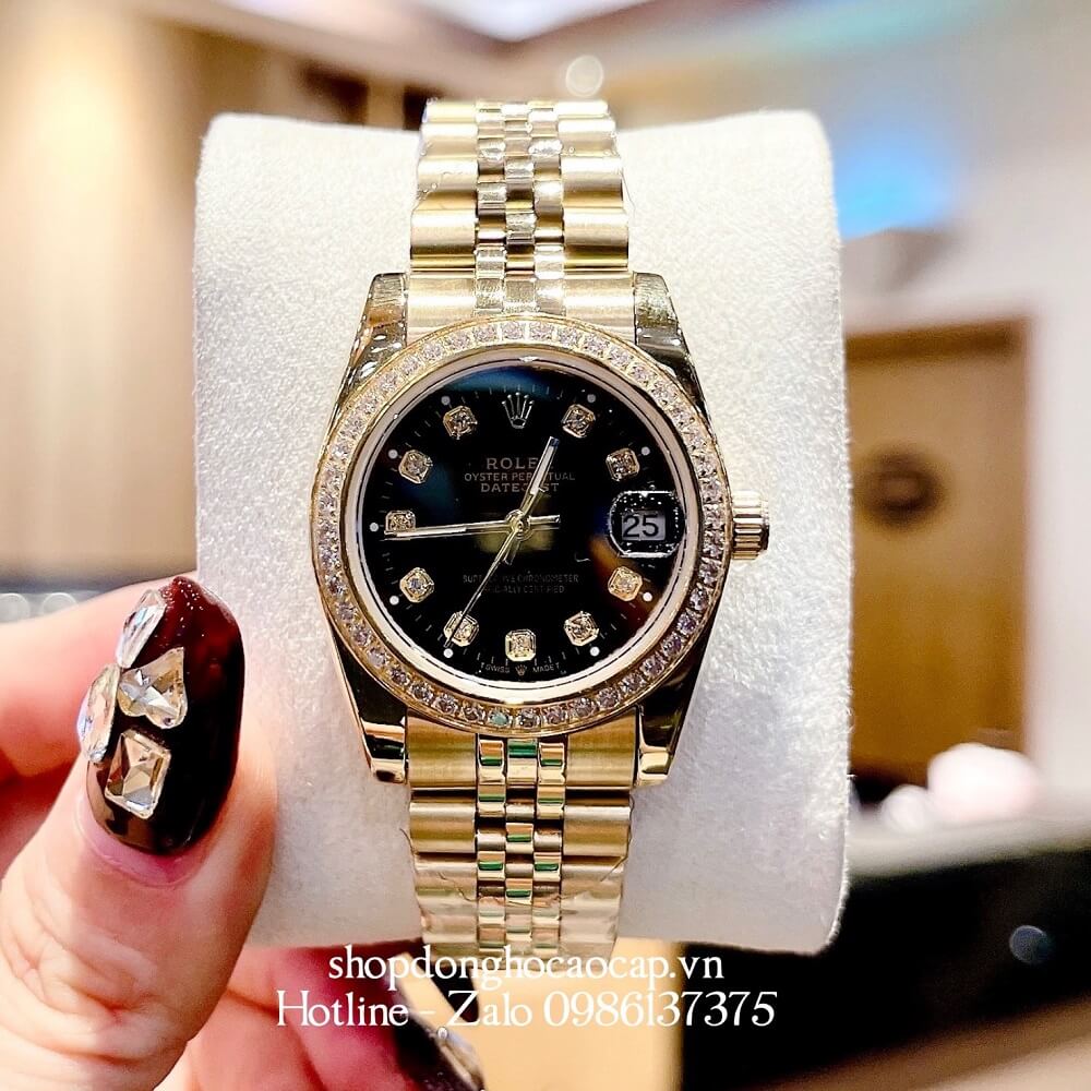Đồng Hồ Rolex Datejust Nữ Dây Vàng Mặt Đen Viền Đá 32mm