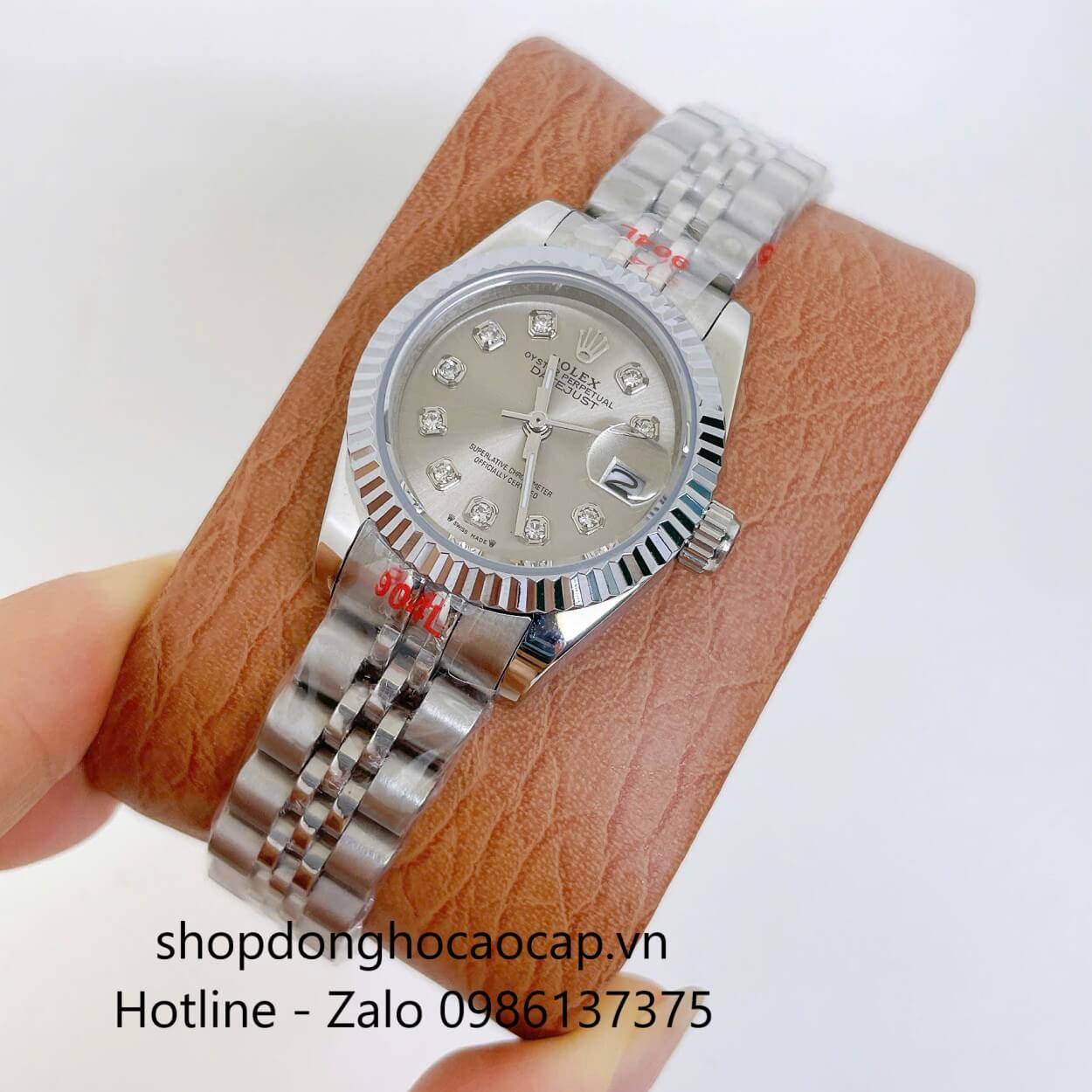 Đồng Hồ Rolex Datejust Nữ Máy Pin Dây Kim Loại Bạc Mặt Xám Size 28mm Viền Khía