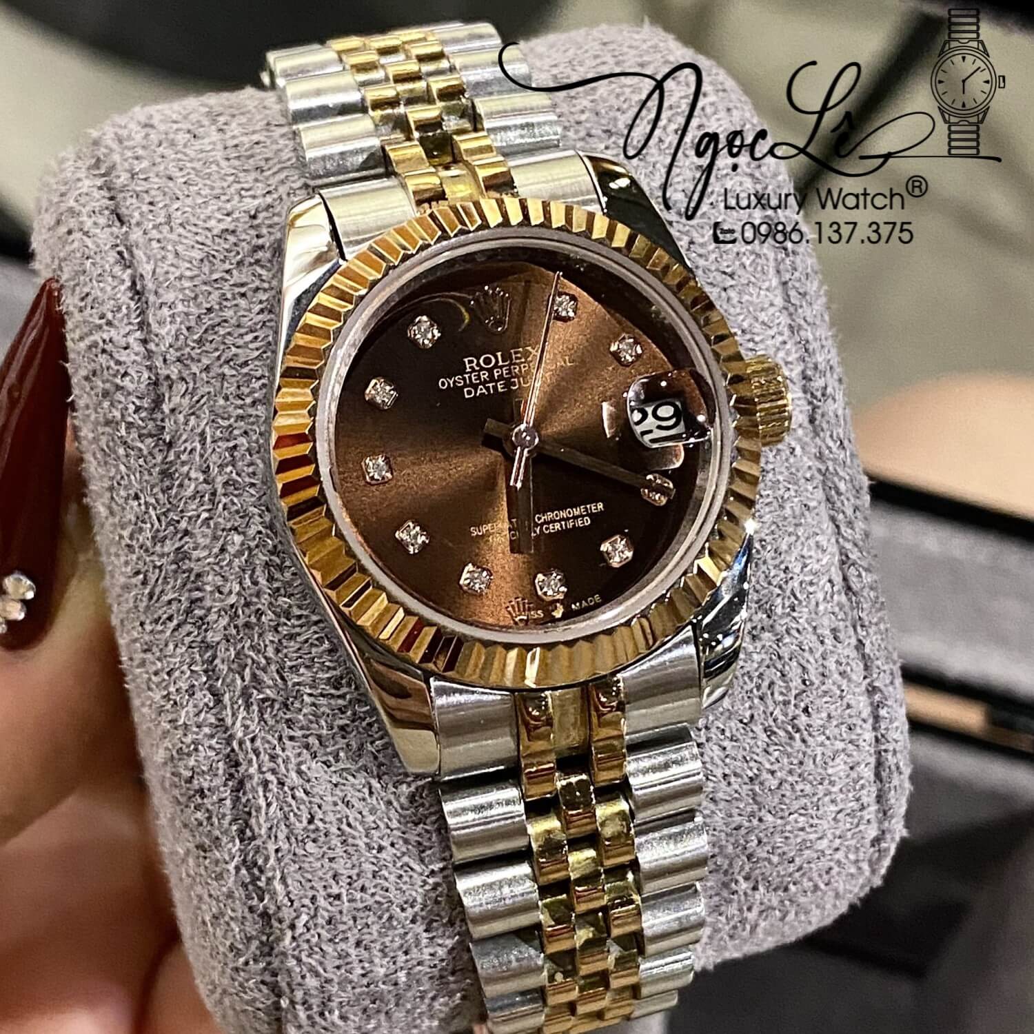 Đồng Hồ Nữ Rolex Datejust Automatic Dây Kim Loại Demi Rose Mặt Nâu Niềng Khía Size 31mm