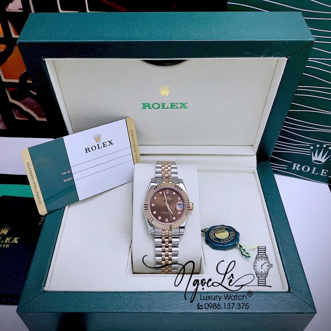 Đồng Hồ Nữ Rolex Datejust Automatic Dây Kim Loại Demi Rose Mặt Nâu Niềng Khía Size 31mm