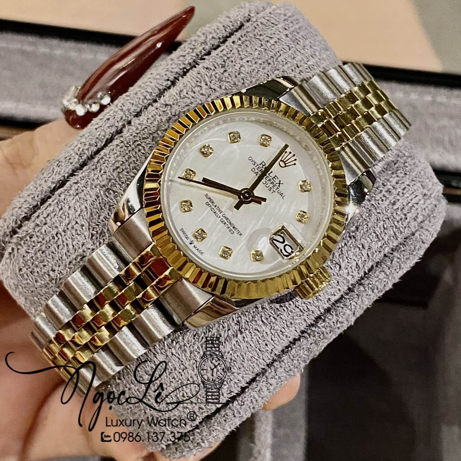 Đồng Hồ Nữ Rolex Datejust Automatic Dây Kim Loại Demi Vàng Mặt Trắng Xà Cừ Niềng Khía Size 31mm