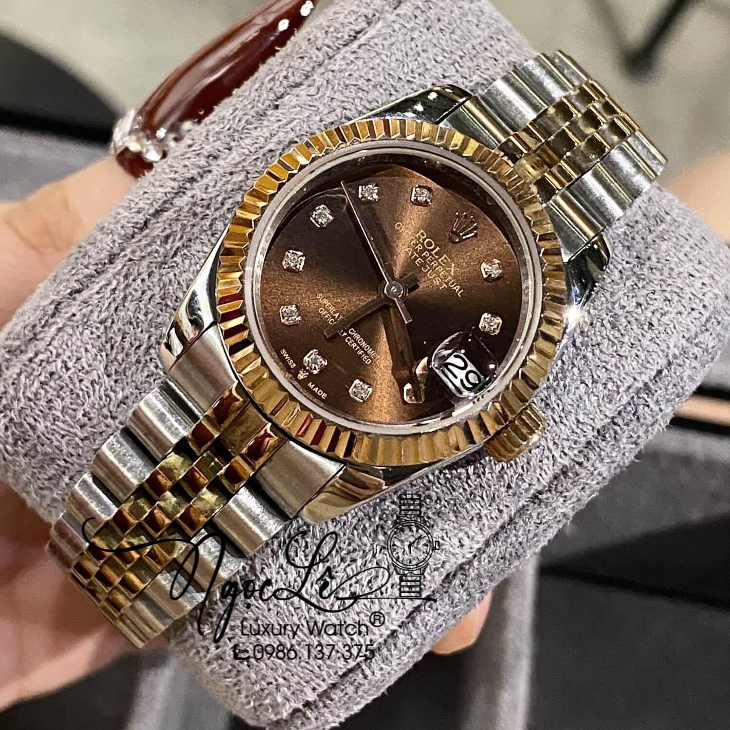 Đồng Hồ Nữ Rolex Datejust Automatic Dây Kim Loại Demi Rose Mặt Nâu Niềng Khía Size 31mm