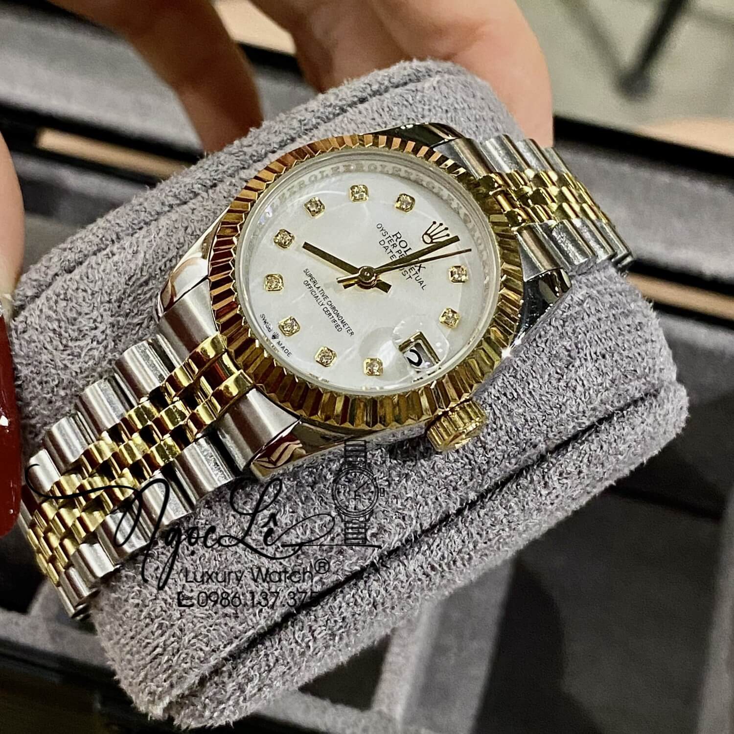 Đồng Hồ Nữ Rolex Datejust Automatic Dây Kim Loại Demi Vàng Mặt Trắng Xà Cừ Niềng Khía Size 31mm