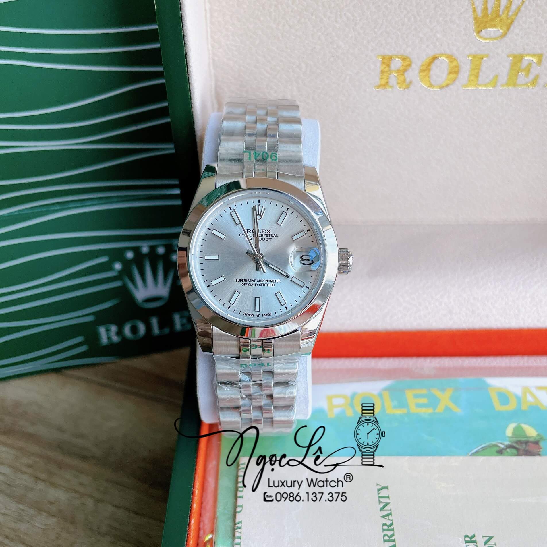 Đồng Hồ Rolex Datejust Automatic Nữ Màu Bạc Mặt Trắng Niềng Trơn Size 31mm