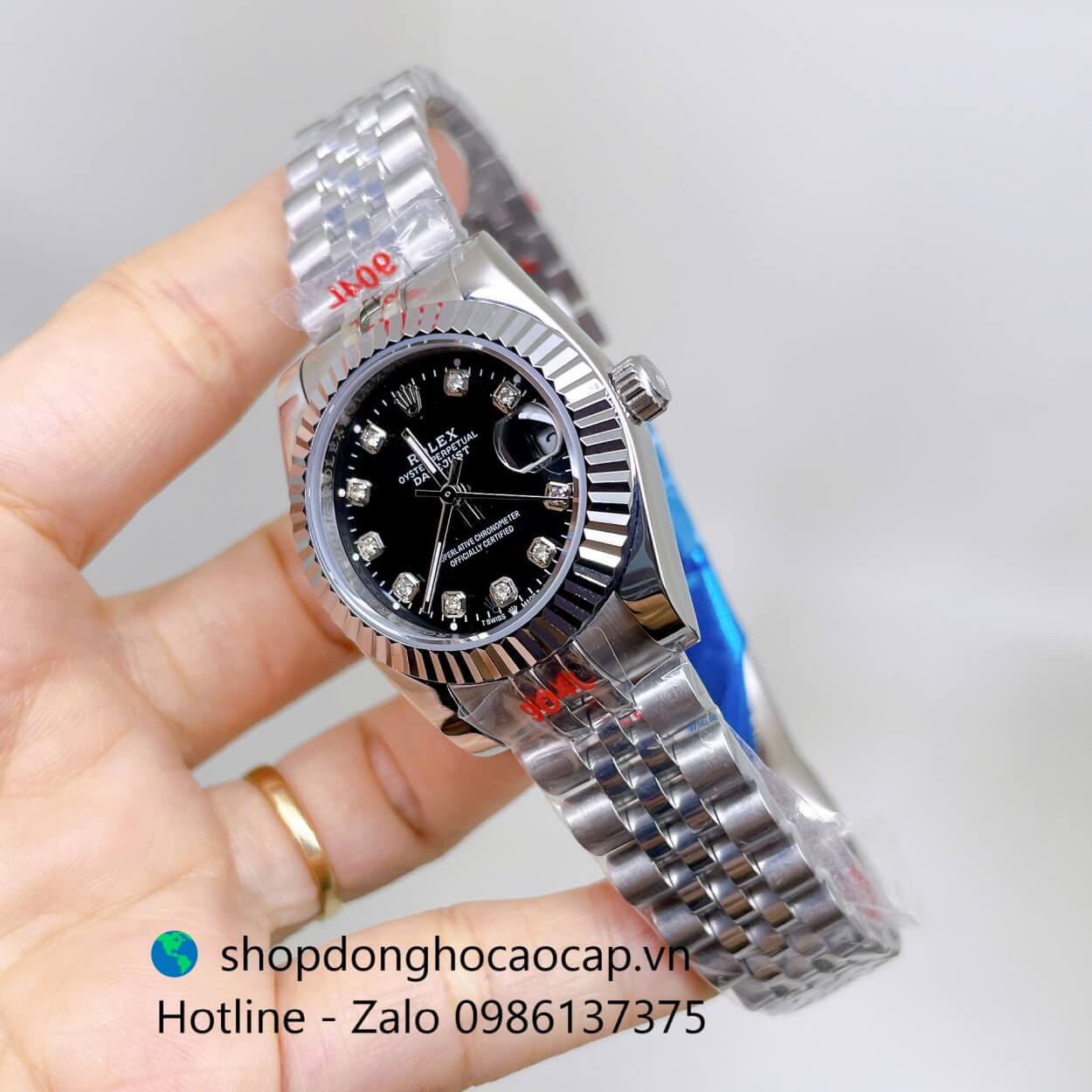 Đồng Hồ Rolex Datejust Nữ Máy Pin Dây Kim Loại Bạc Mặt Đen Niềng Khía Size 31mm