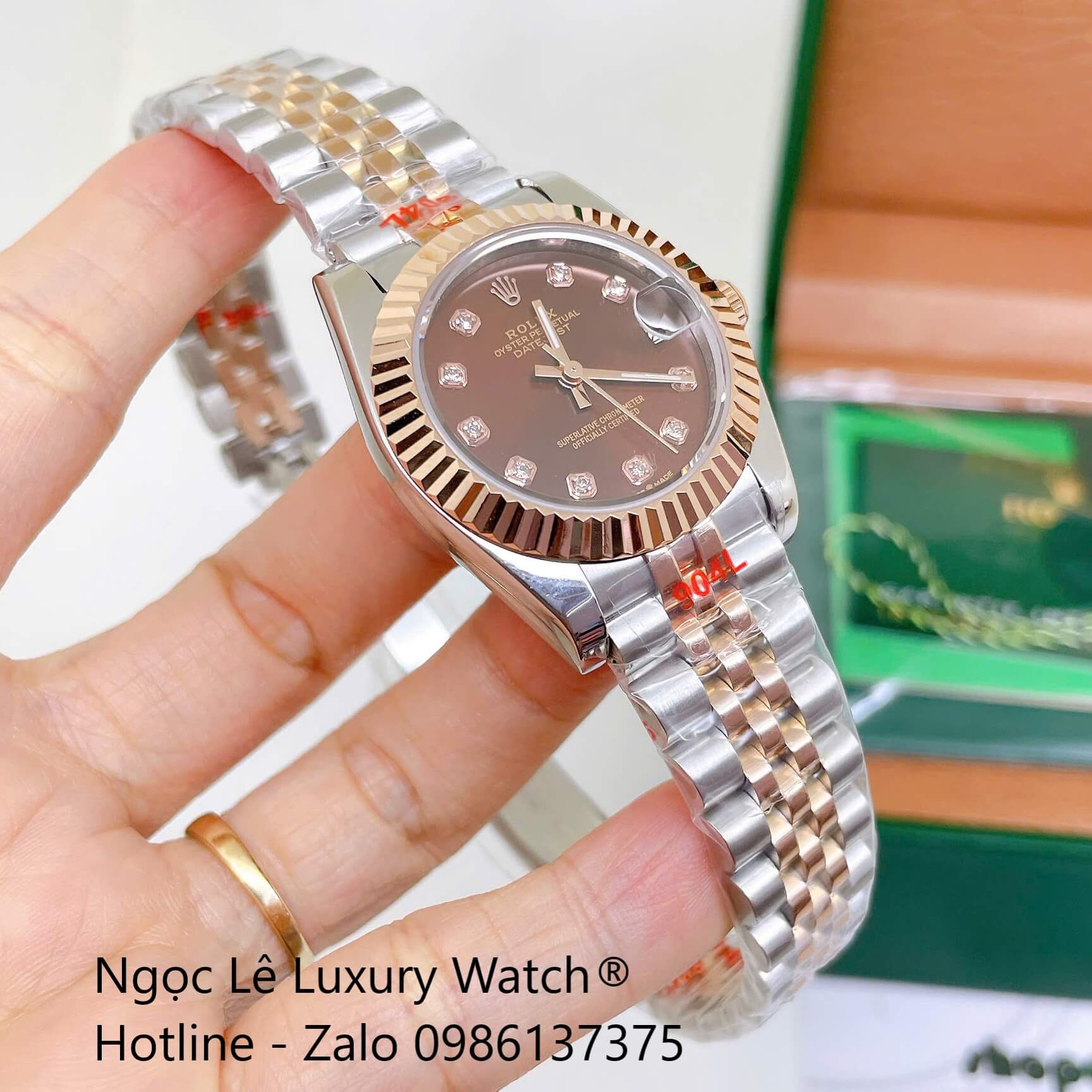 Đồng Hồ Rolex Datejust Nữ Máy Pin Dây Kim Loại Demi Rose Mặt Nâu Niềng Khía Size 31mm