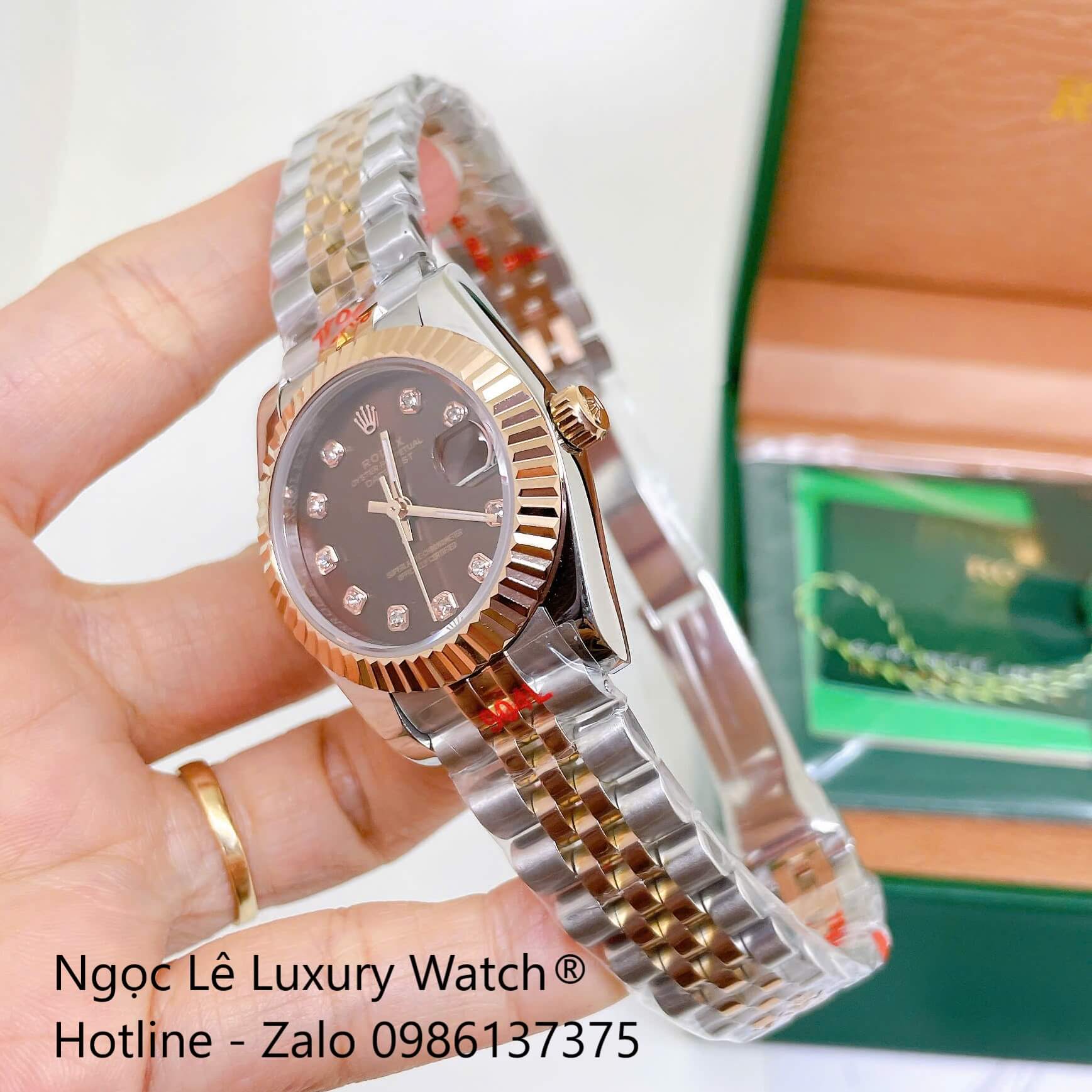 Đồng Hồ Rolex Datejust Nữ Máy Pin Dây Kim Loại Demi Rose Mặt Nâu Niềng Khía Size 31mm