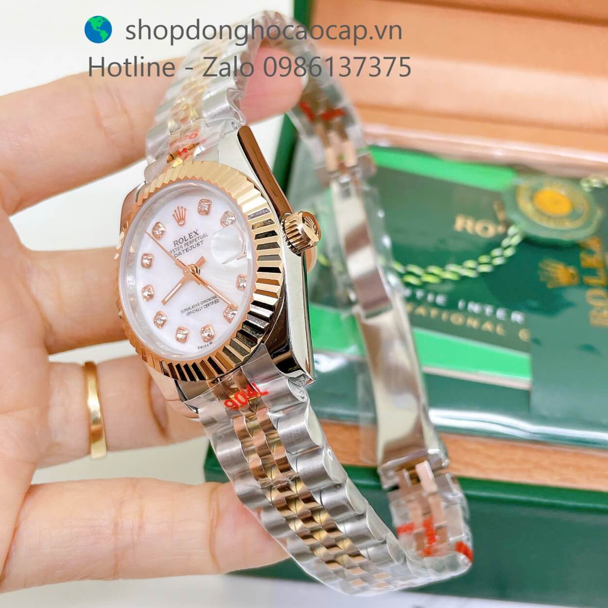 Đồng Hồ Rolex Datejust Nữ Máy Pin Dây Kim Loại Demi Rose Mặt Trắng Xà Cừ Niềng Khía Size 31mm