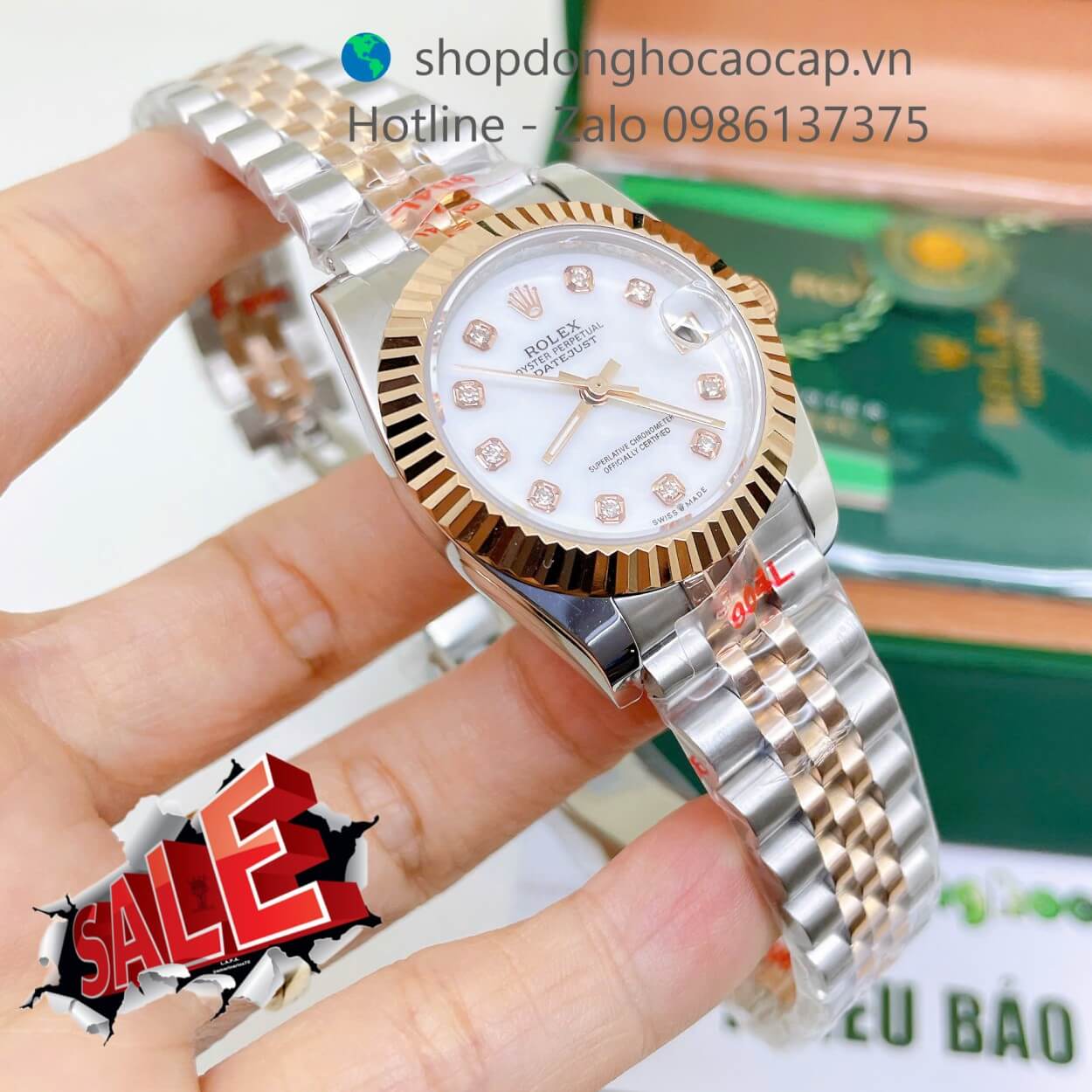 Đồng Hồ Rolex Datejust Nữ Máy Pin Dây Kim Loại Demi Rose Mặt Trắng Xà Cừ Niềng Khía Size 31mm