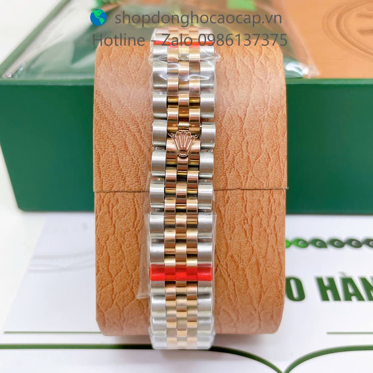 Đồng Hồ Rolex Datejust Nữ Máy Pin Dây Kim Loại Demi Rose Mặt Trắng Xà Cừ Niềng Khía Size 31mm