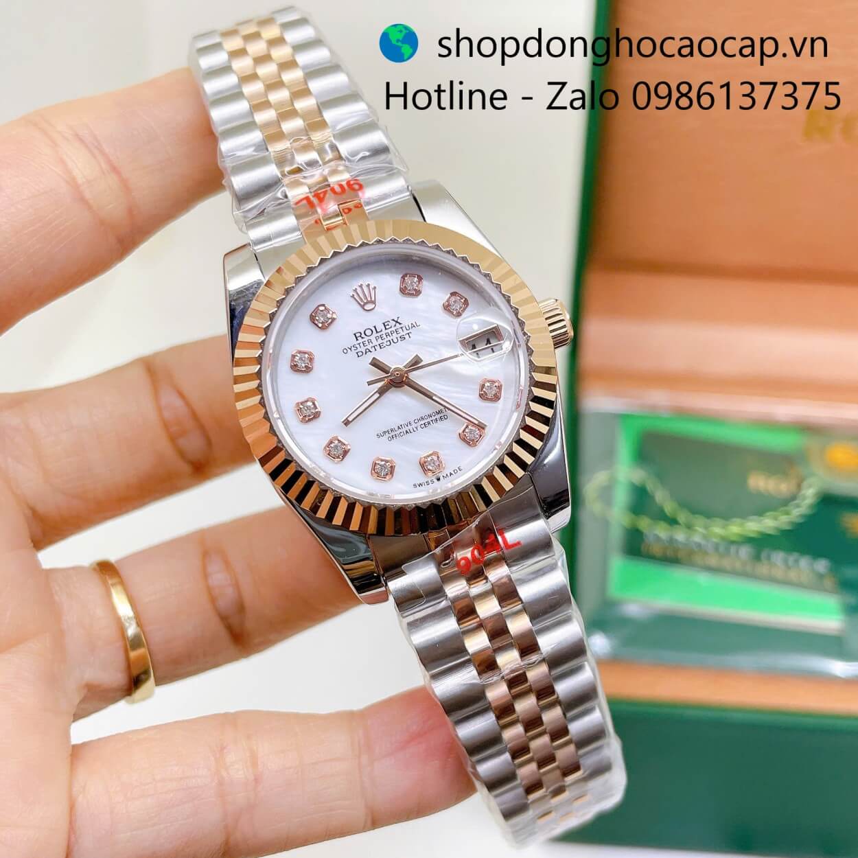 Đồng Hồ Rolex Datejust Nữ Máy Pin Dây Kim Loại Demi Rose Mặt Trắng Xà Cừ Niềng Khía Size 31mm