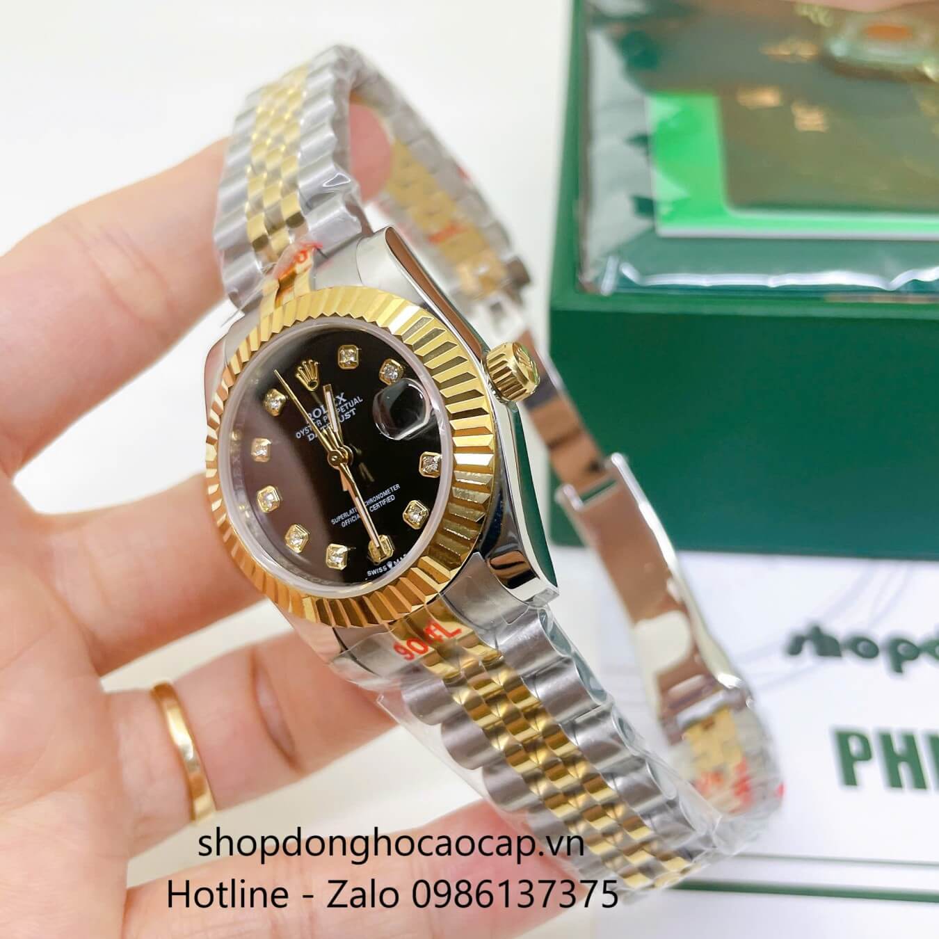 Đồng Hồ Rolex Datejust Nữ Máy Pin Dây Kim Loại Demi Vàng Mặt Đen Niềng Khía Size 31mm